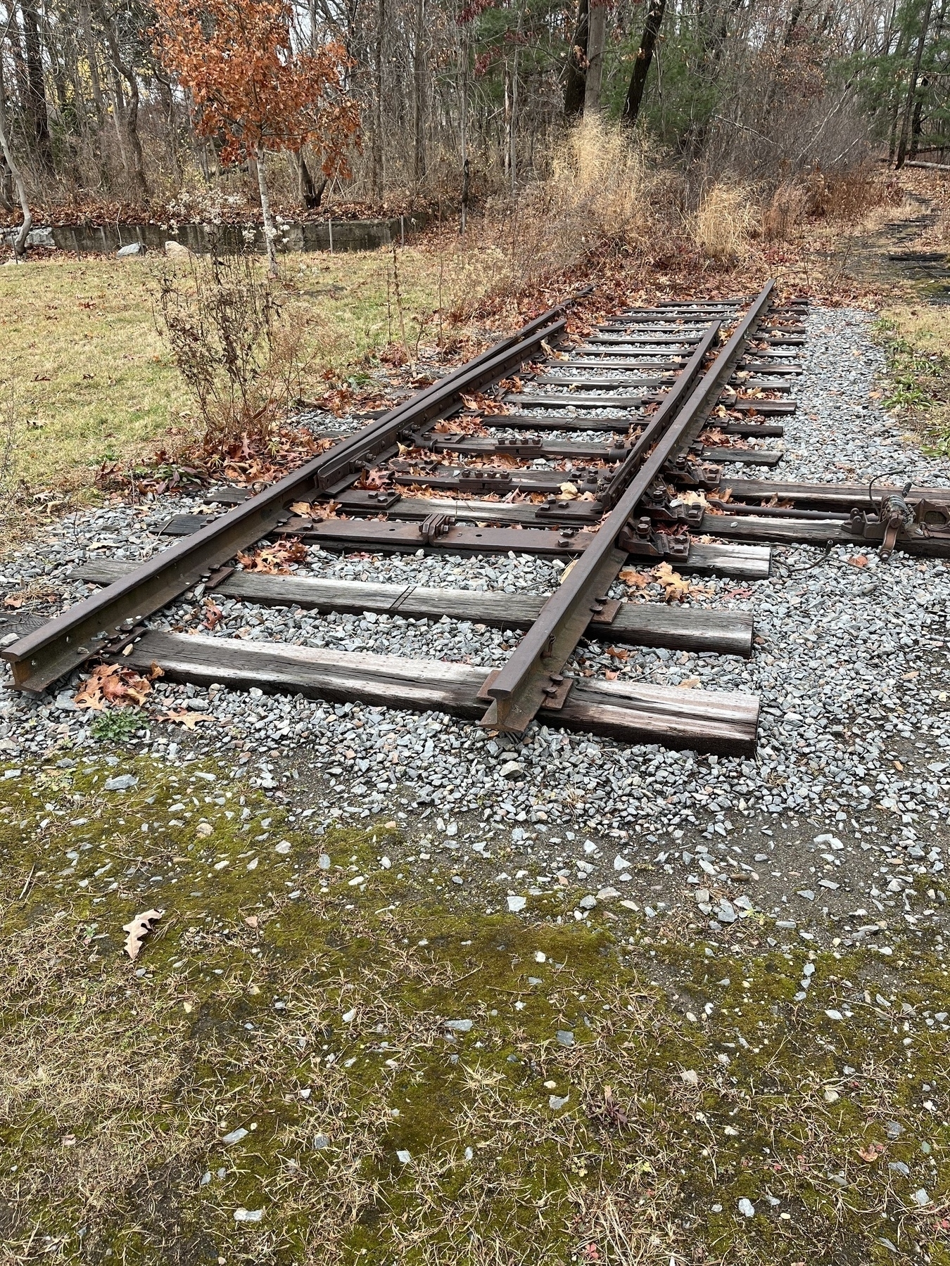 Photo of a piece of train track, about 20 feet / 6 meters long.