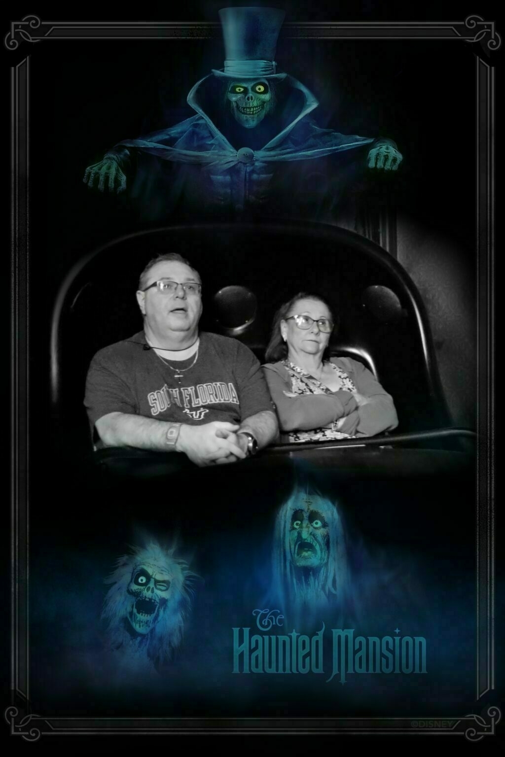 Two people are sitting on a ride at The Haunted Mansion with ghostly figures around them.