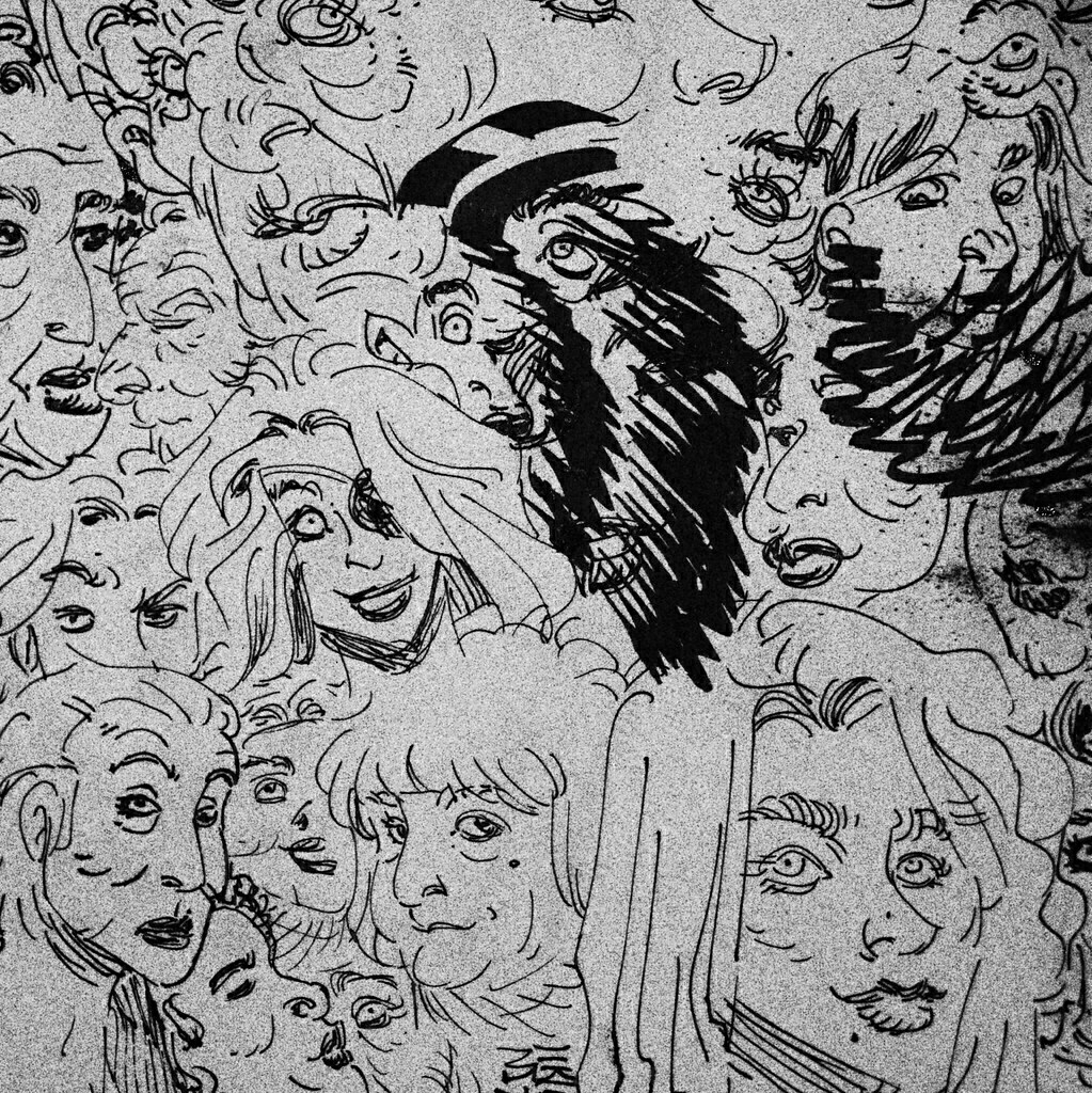 Ink draw, multitude of female faces.