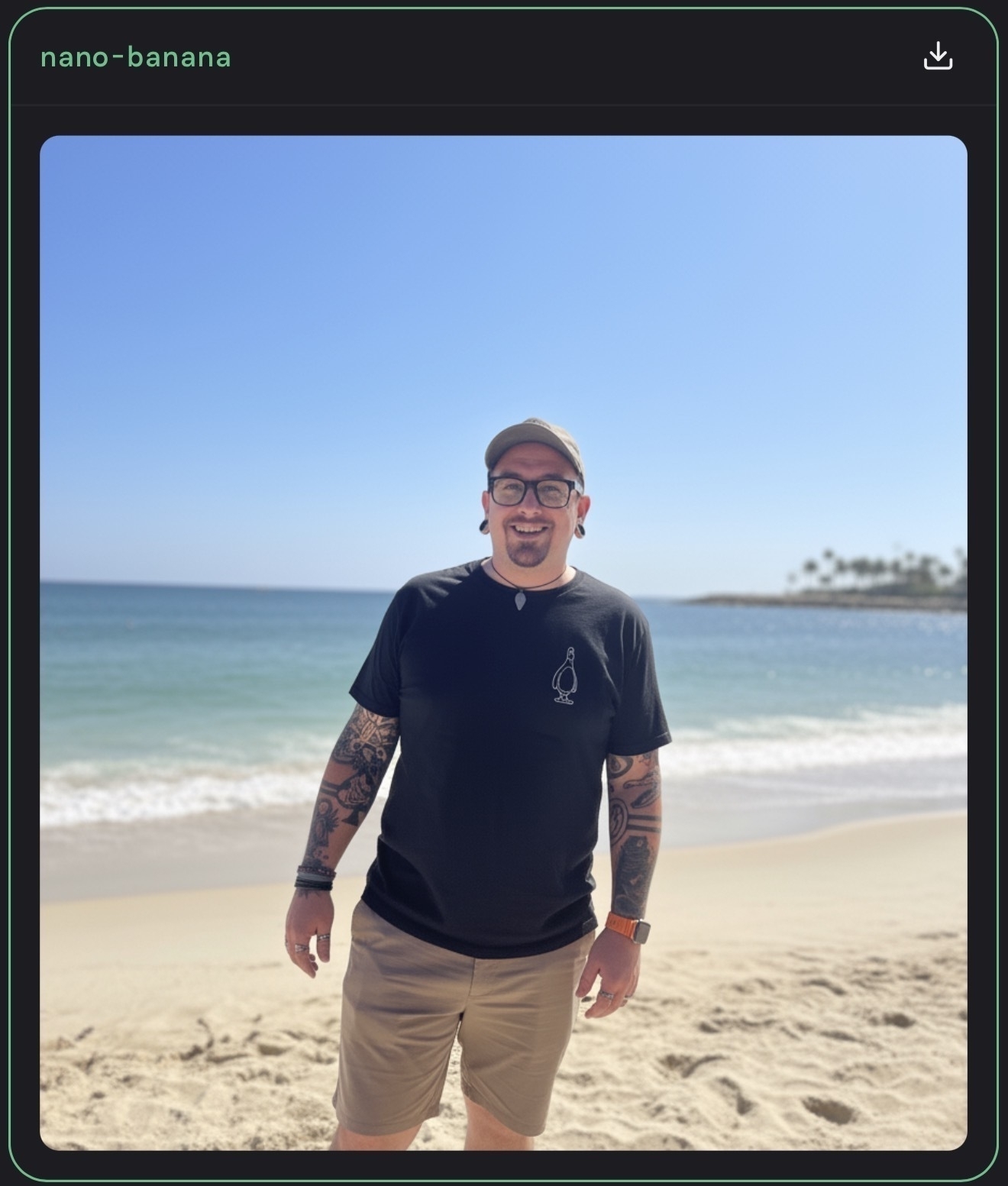 Auto-generated description: A person wearing a black t-shirt and beige shorts is standing on a beach with the ocean and a clear sky in the background.