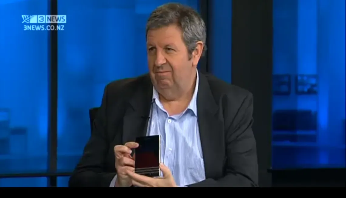 NZ technology journalist Bill Bennett showing the BlackBerry Passport on TV3 Firstline. 
