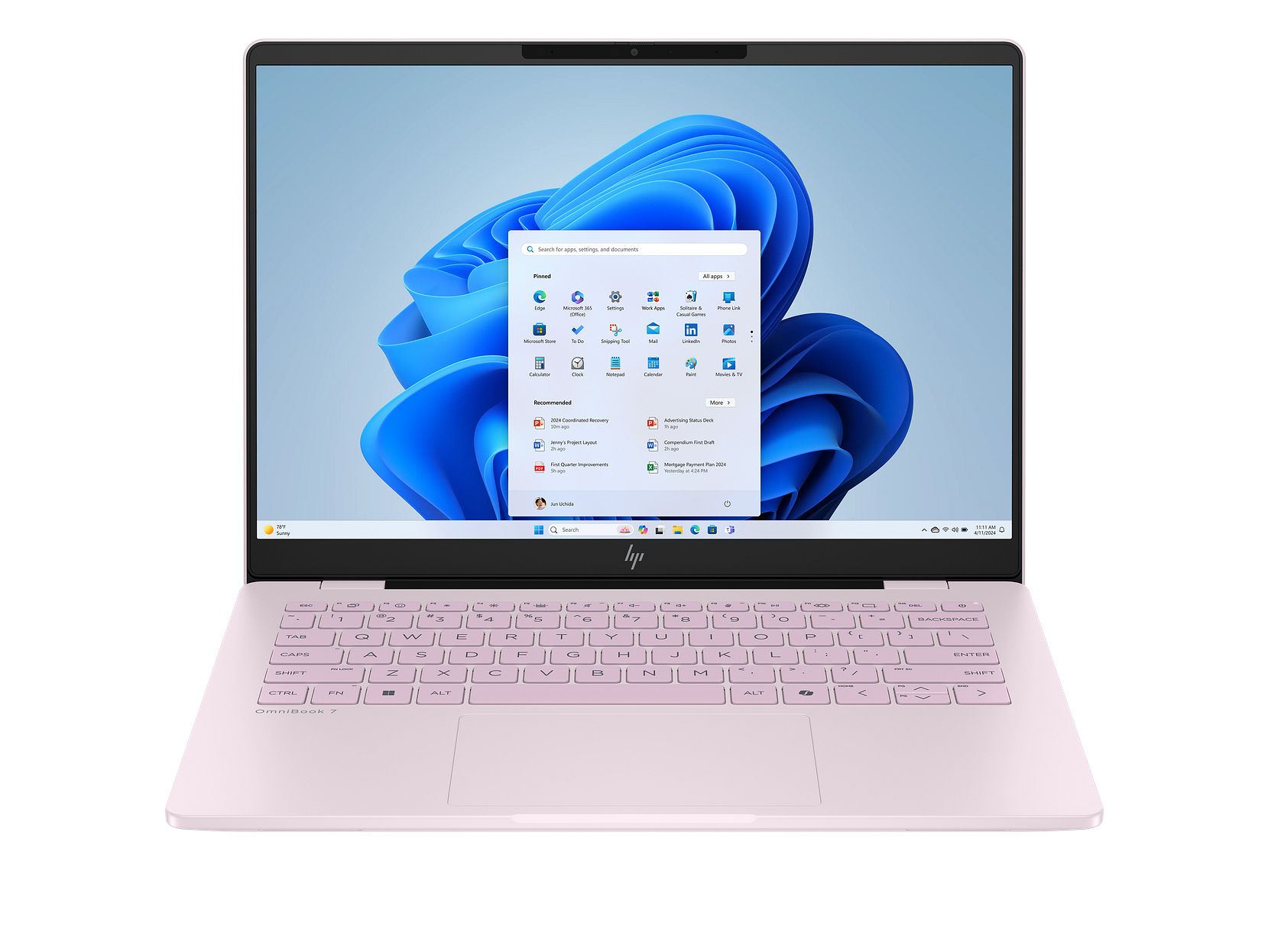 HP OmniBook 7 Laptop AI laptop with a pink keyboard displays a Windows 11 home screen featuring a blue abstract background.