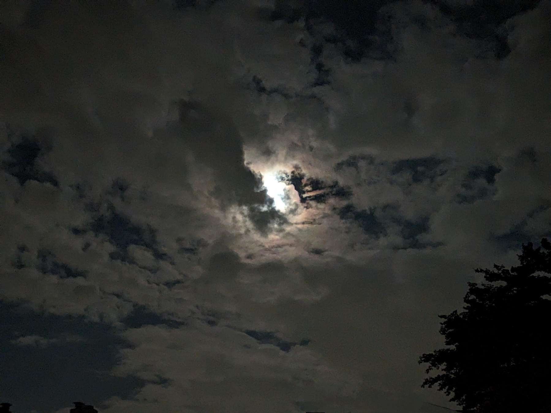 Moonlight behind clouds