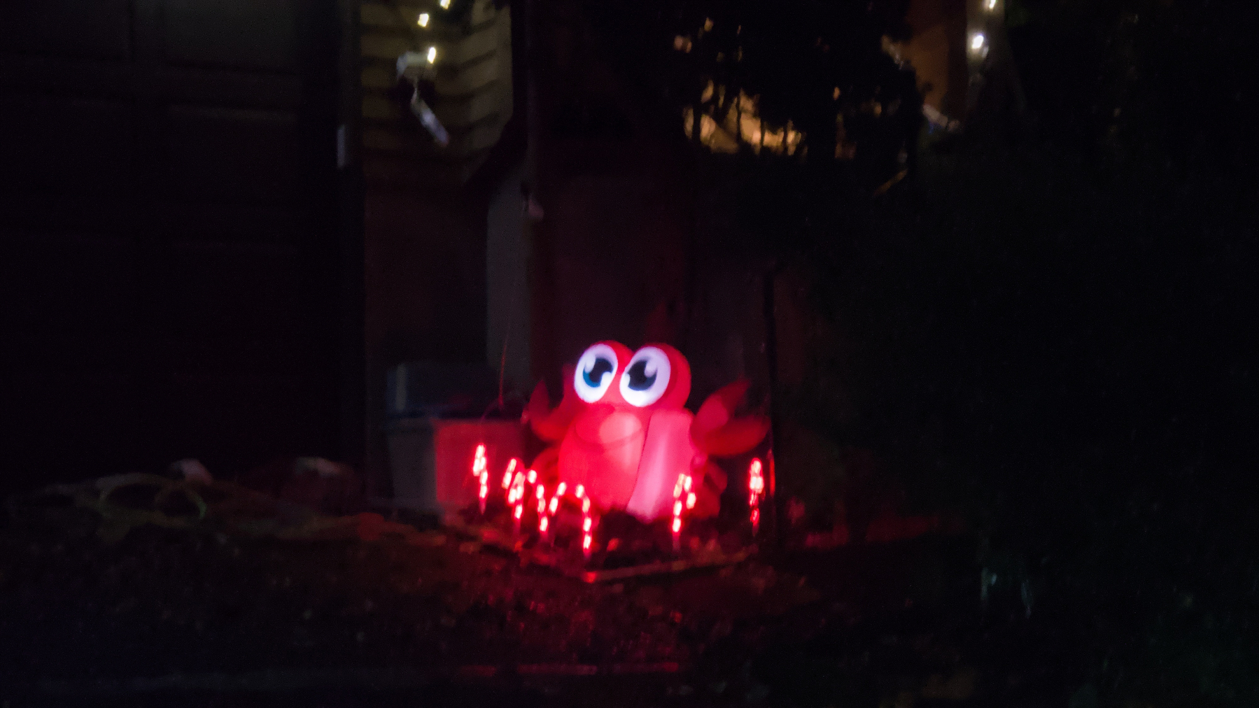 light-up inflatable crab surrounded by candy cane lights
