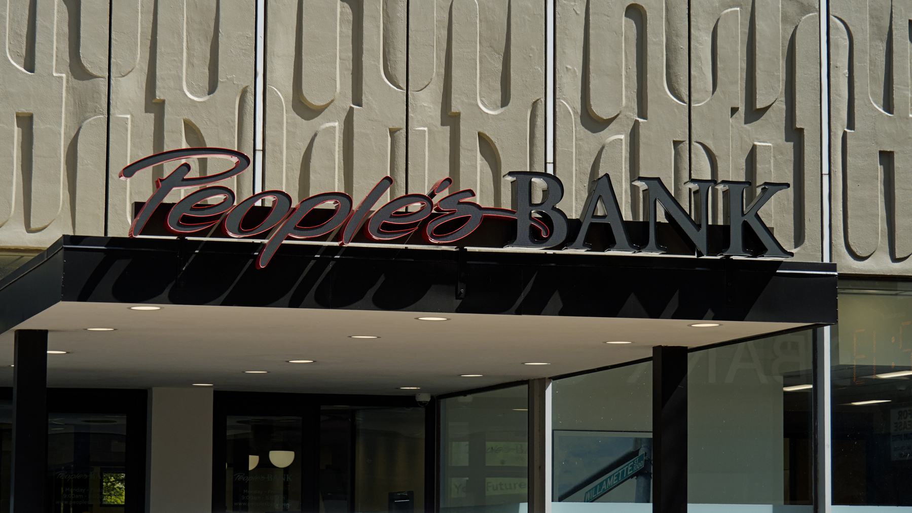 old People's Bank facade with outdated neon sign
