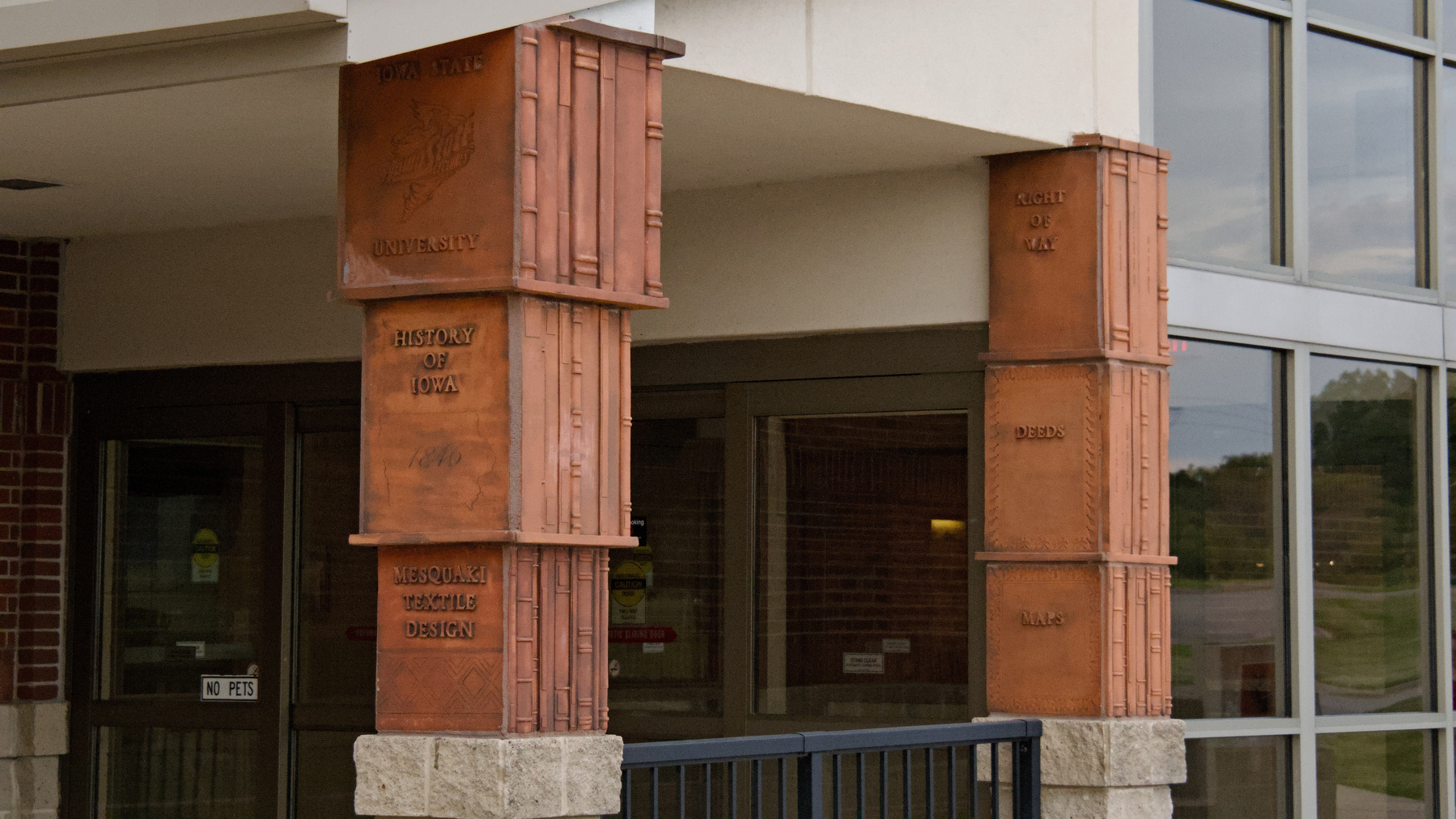 Masonry pillars dressed up as faux books