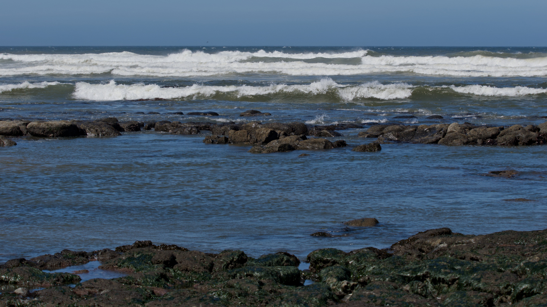 waves at a rocky shoreline