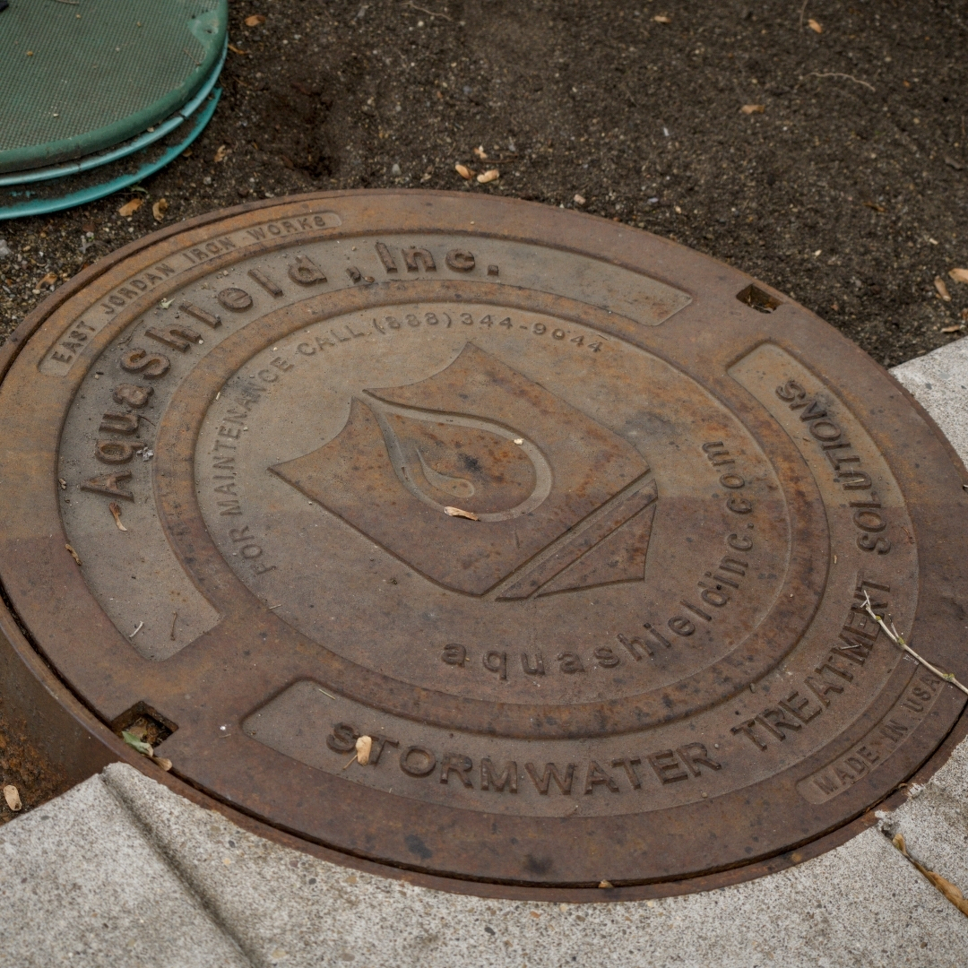 manhole cover advertising aquashieldinc.com