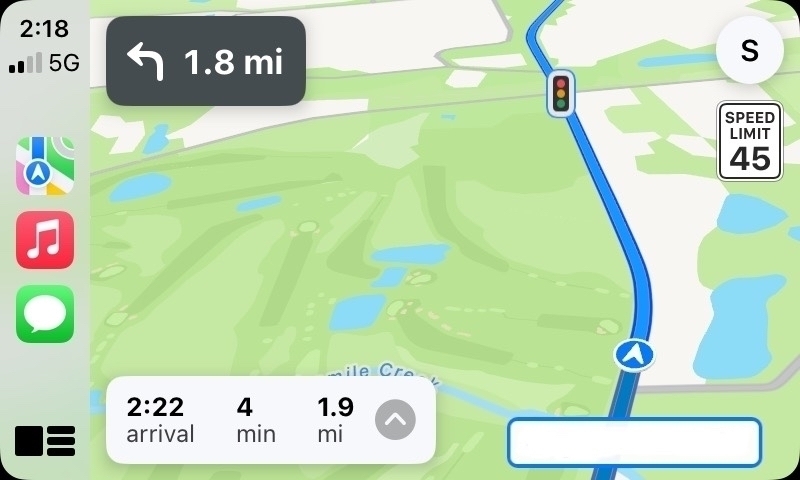 Screen shot of Apple Maps on CarPlay showing detail of a local golf course, including fairways, greens, and traps