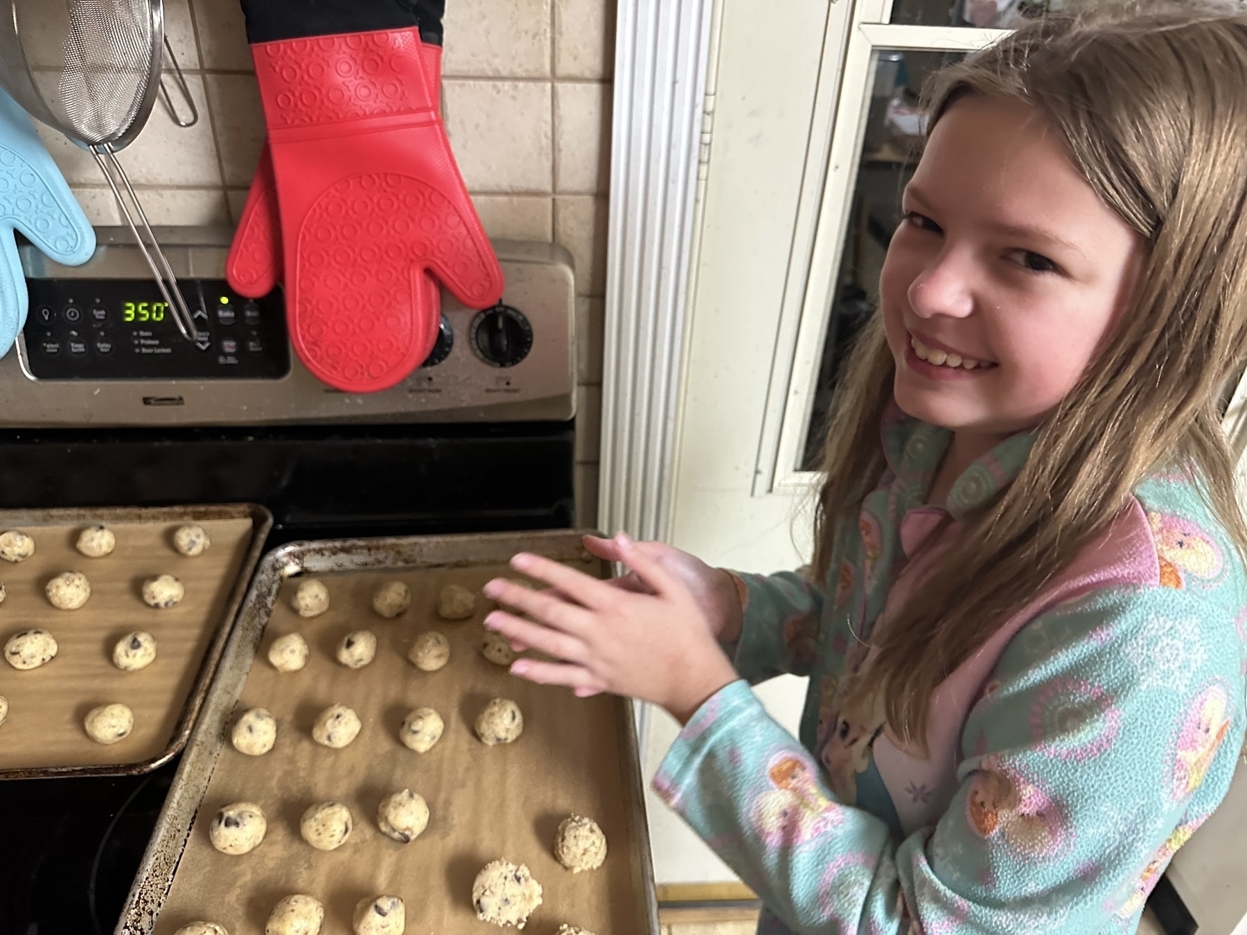 My daughter Lauren rolling cookie dough into balls