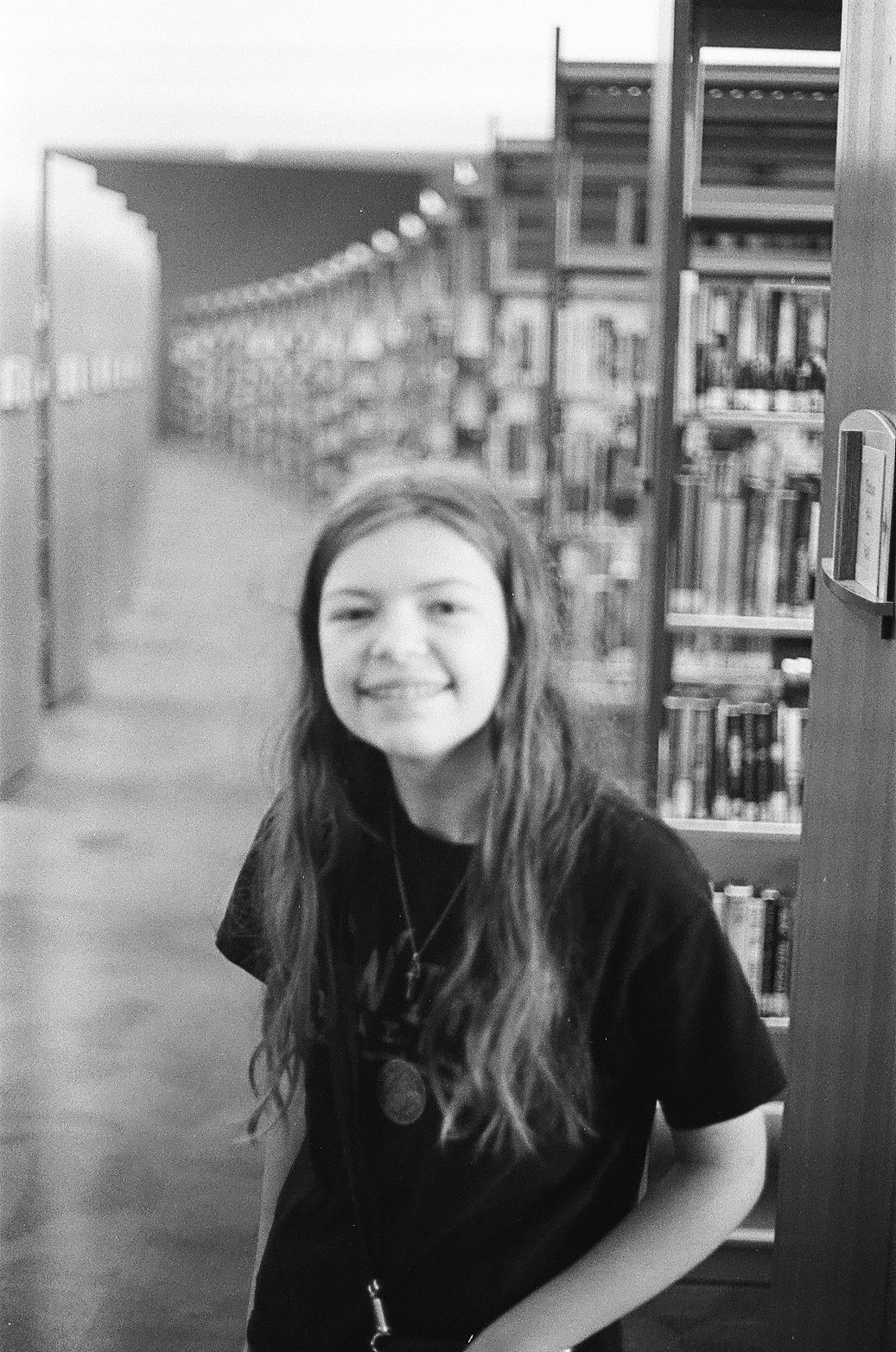 My daughter, slightly out of focus, in the stacks at the Indianapolis Public Library.