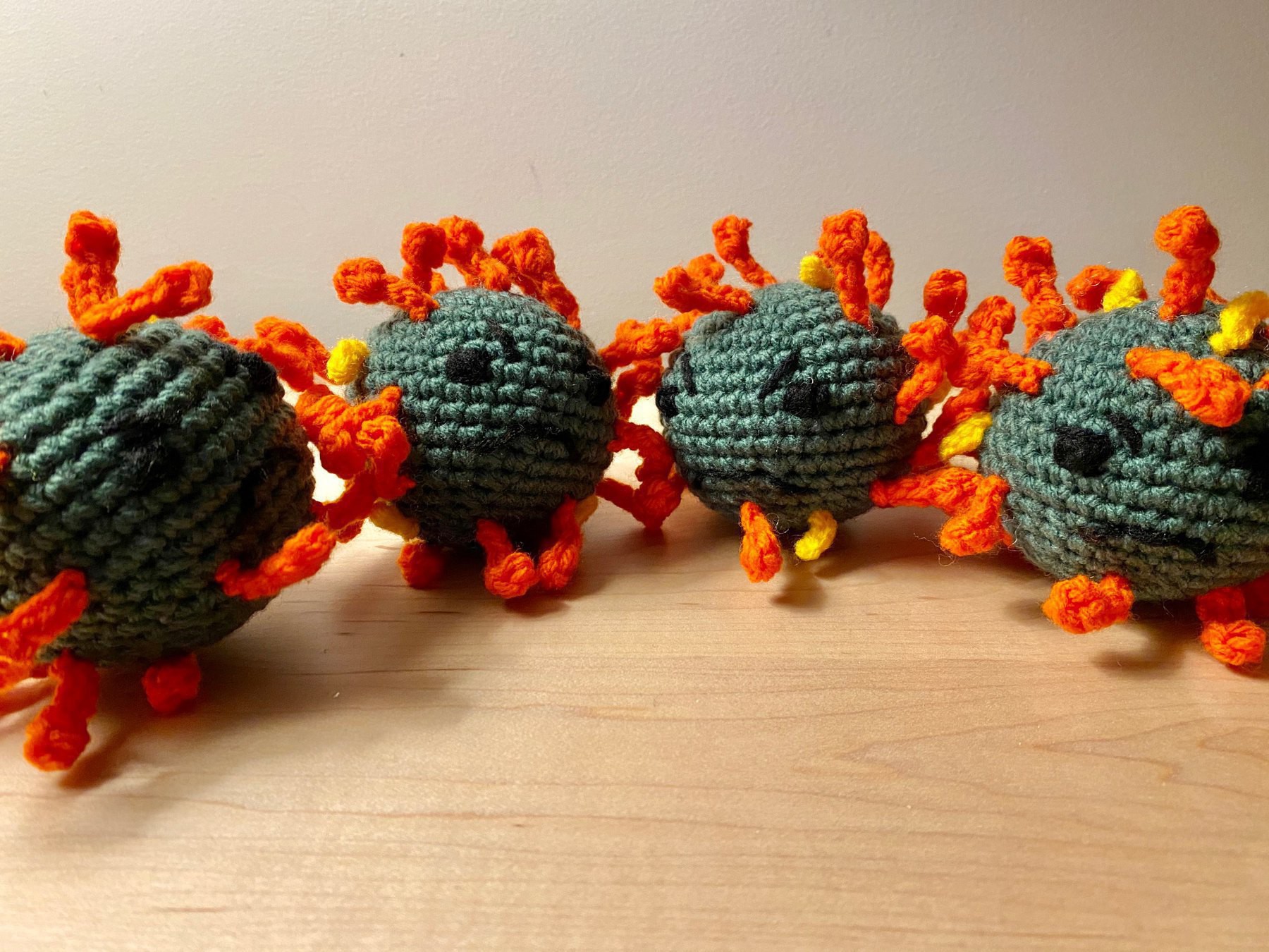 Crocheted little Covid-19 characters