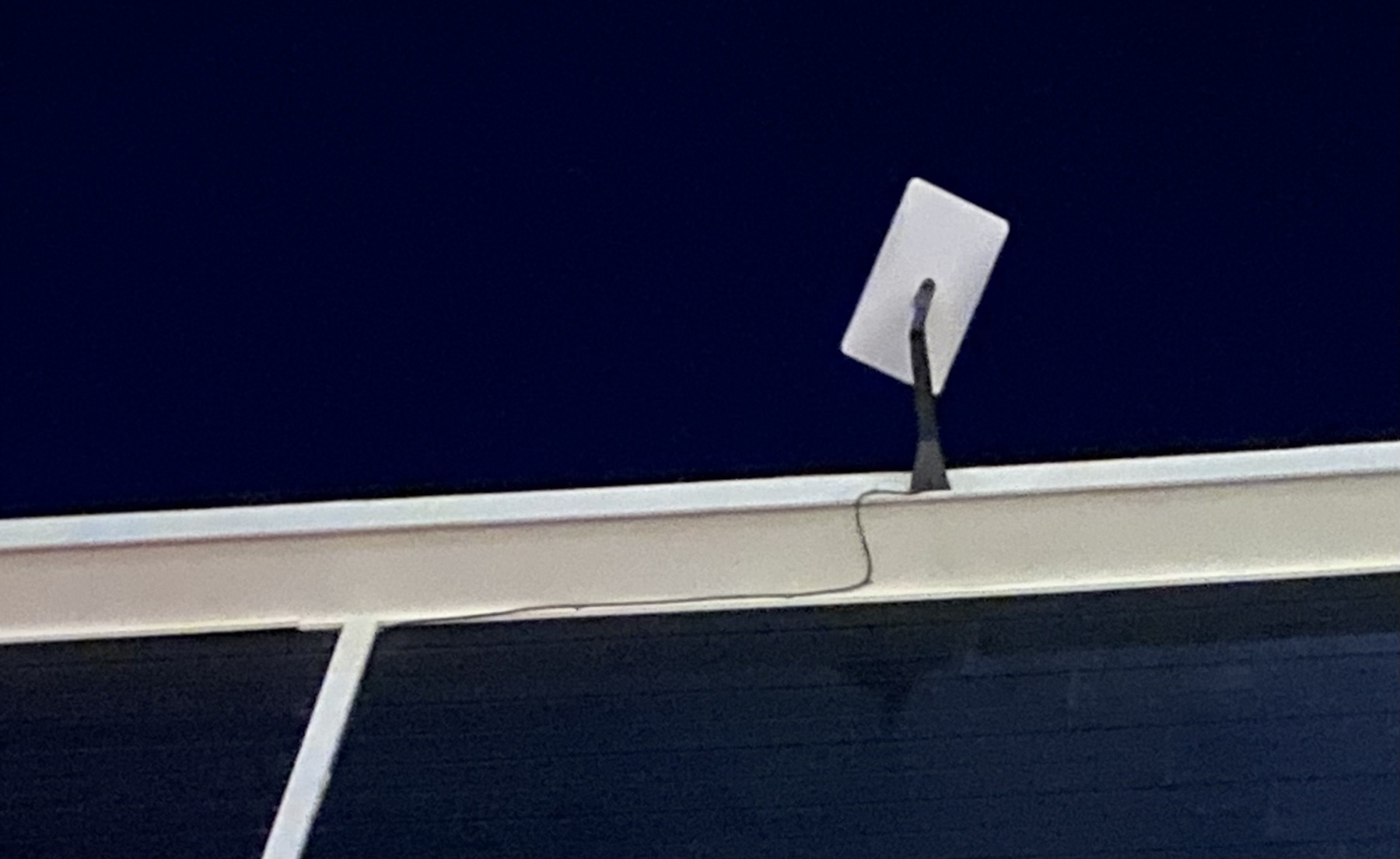 StarLink antenna against a night sky