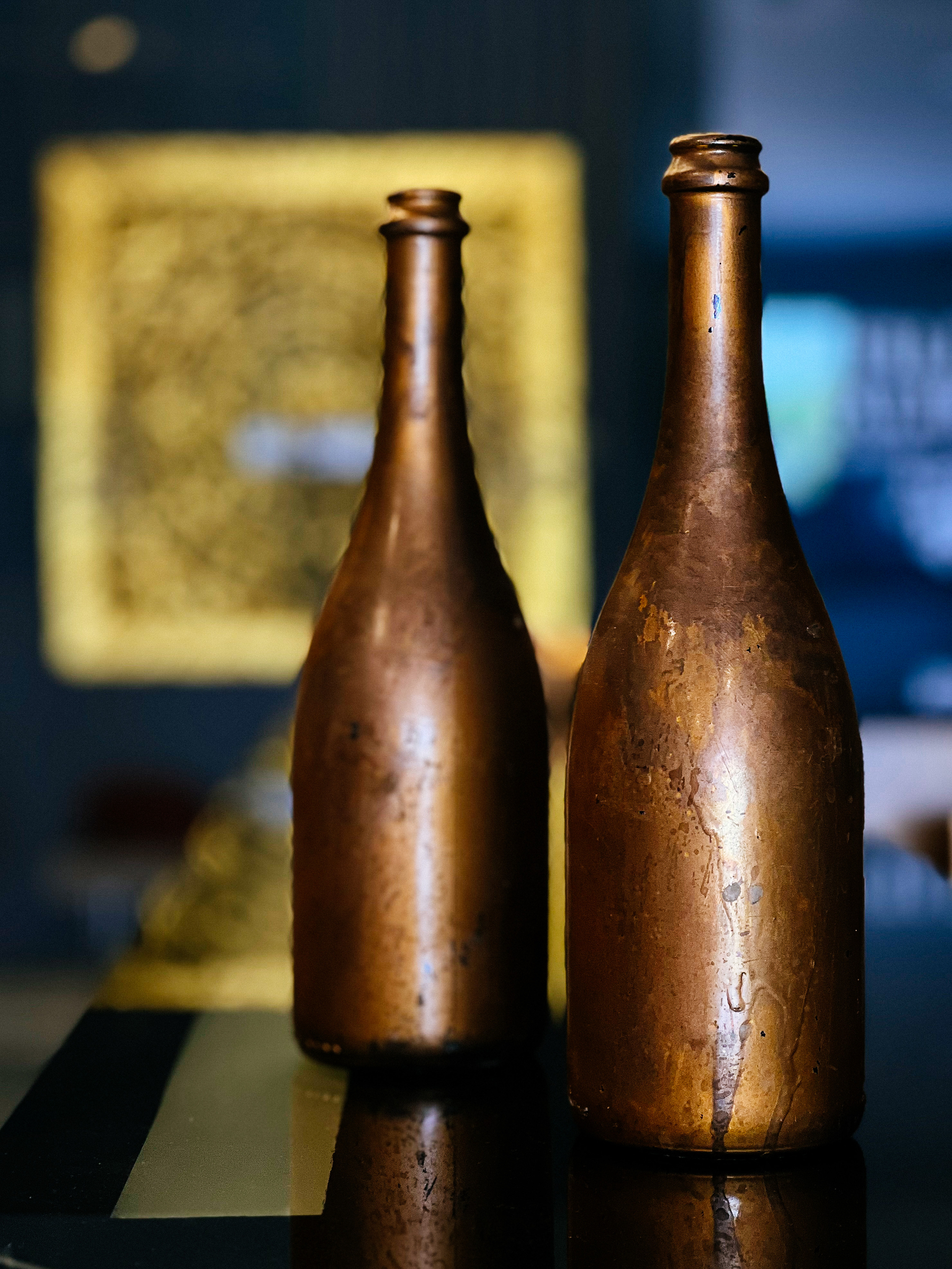 Two copper bottles