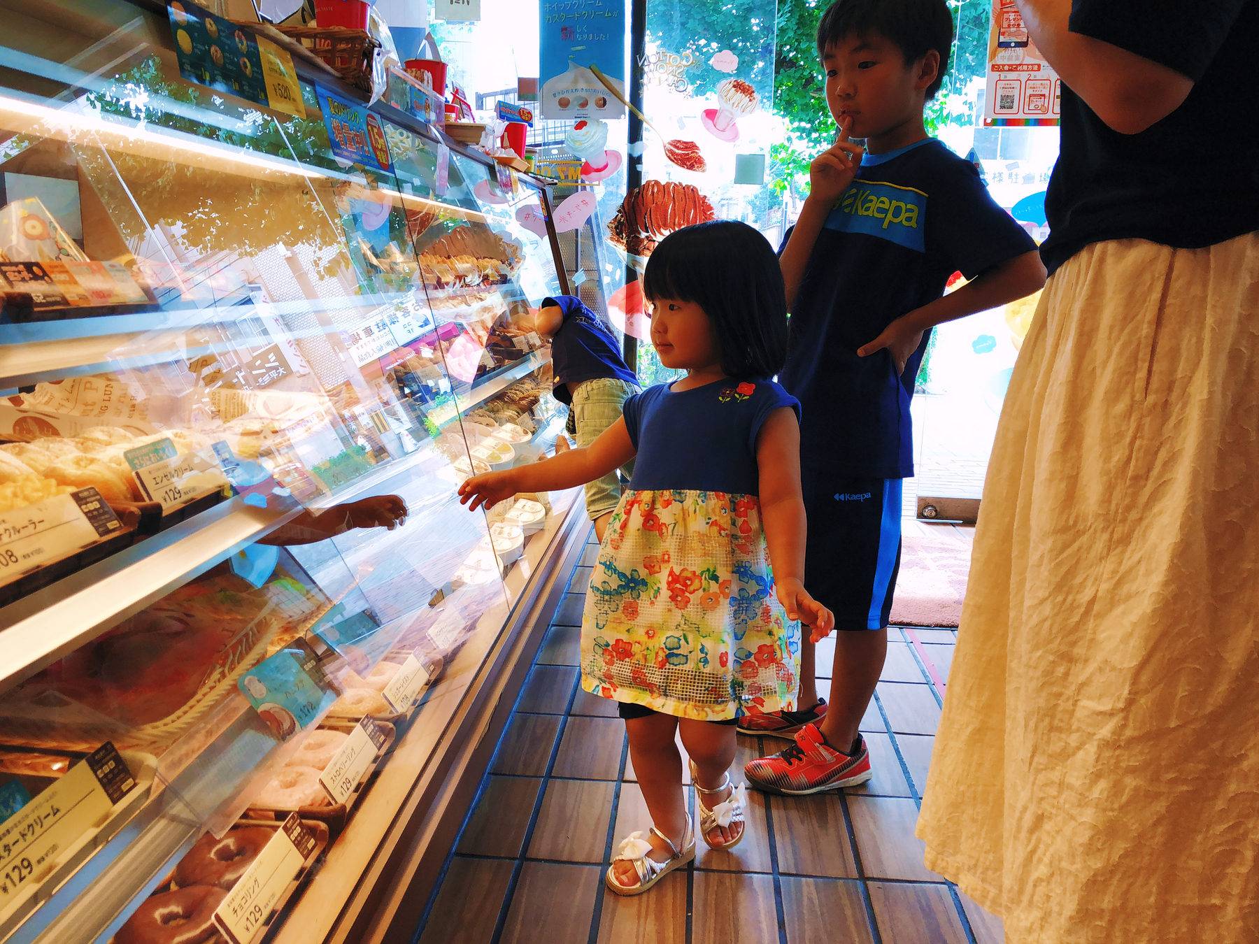 Kids in a candy store, looking at the display
