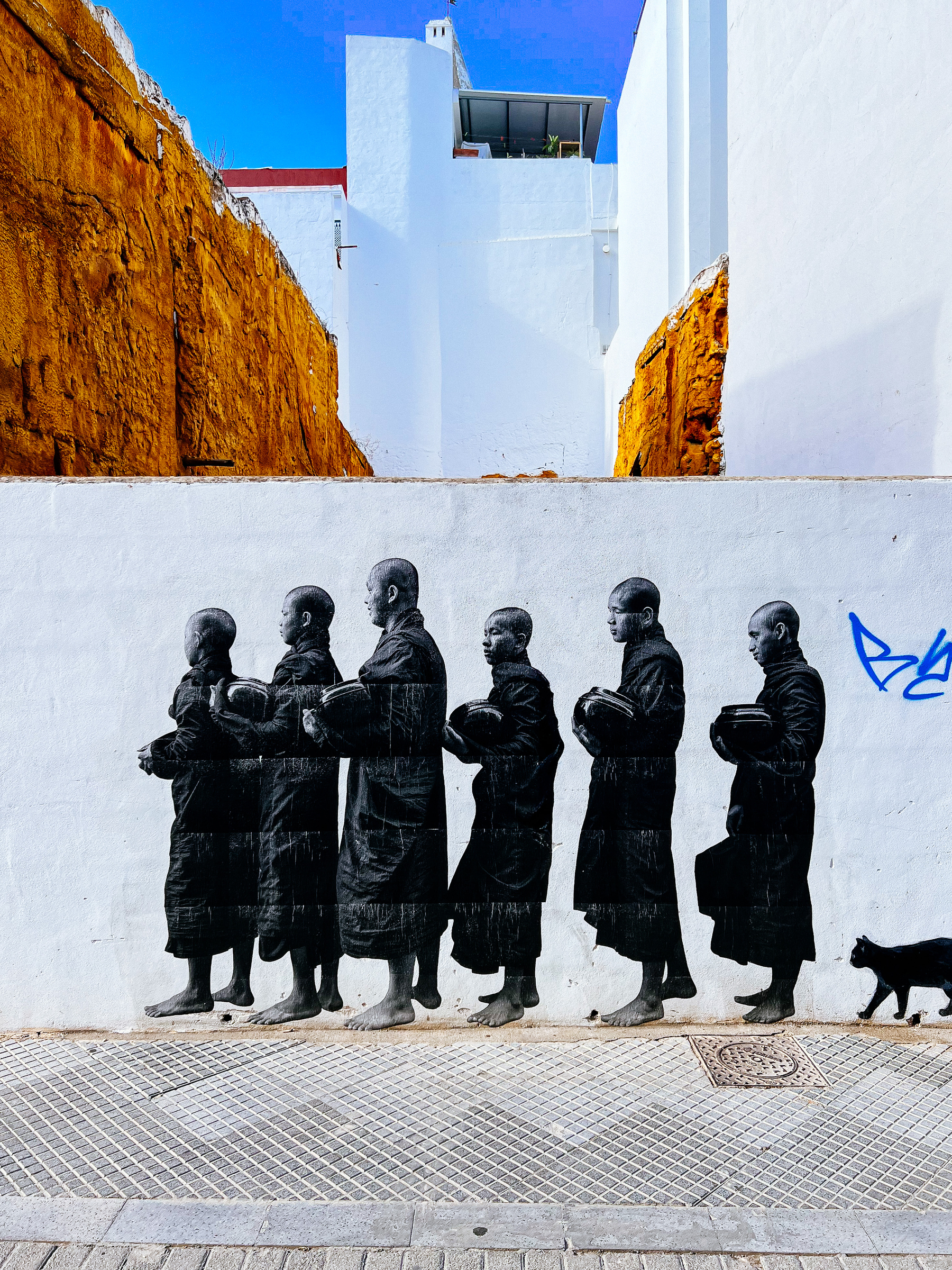 street art, monks asking for alms