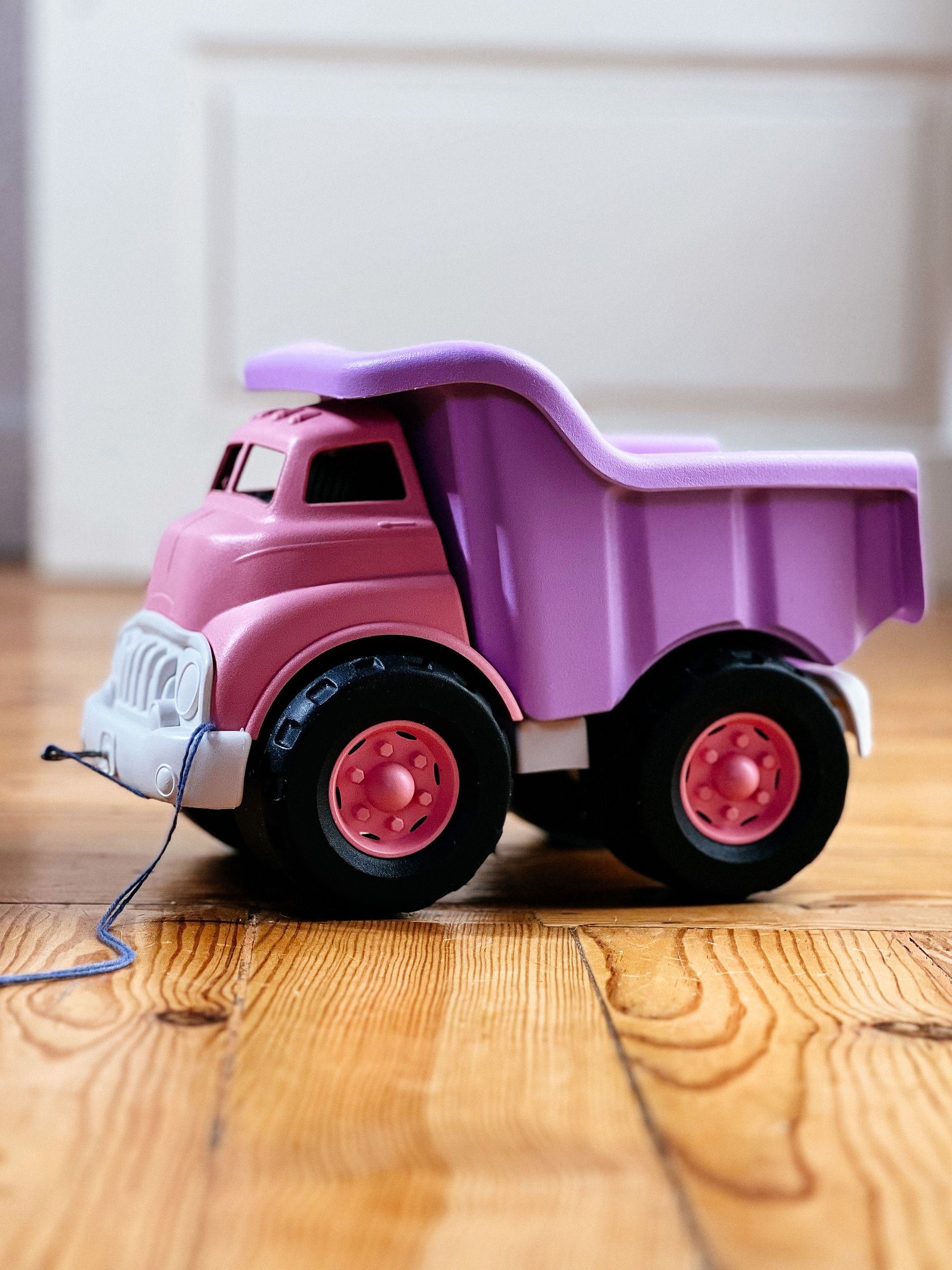 A pink and purple toy truck