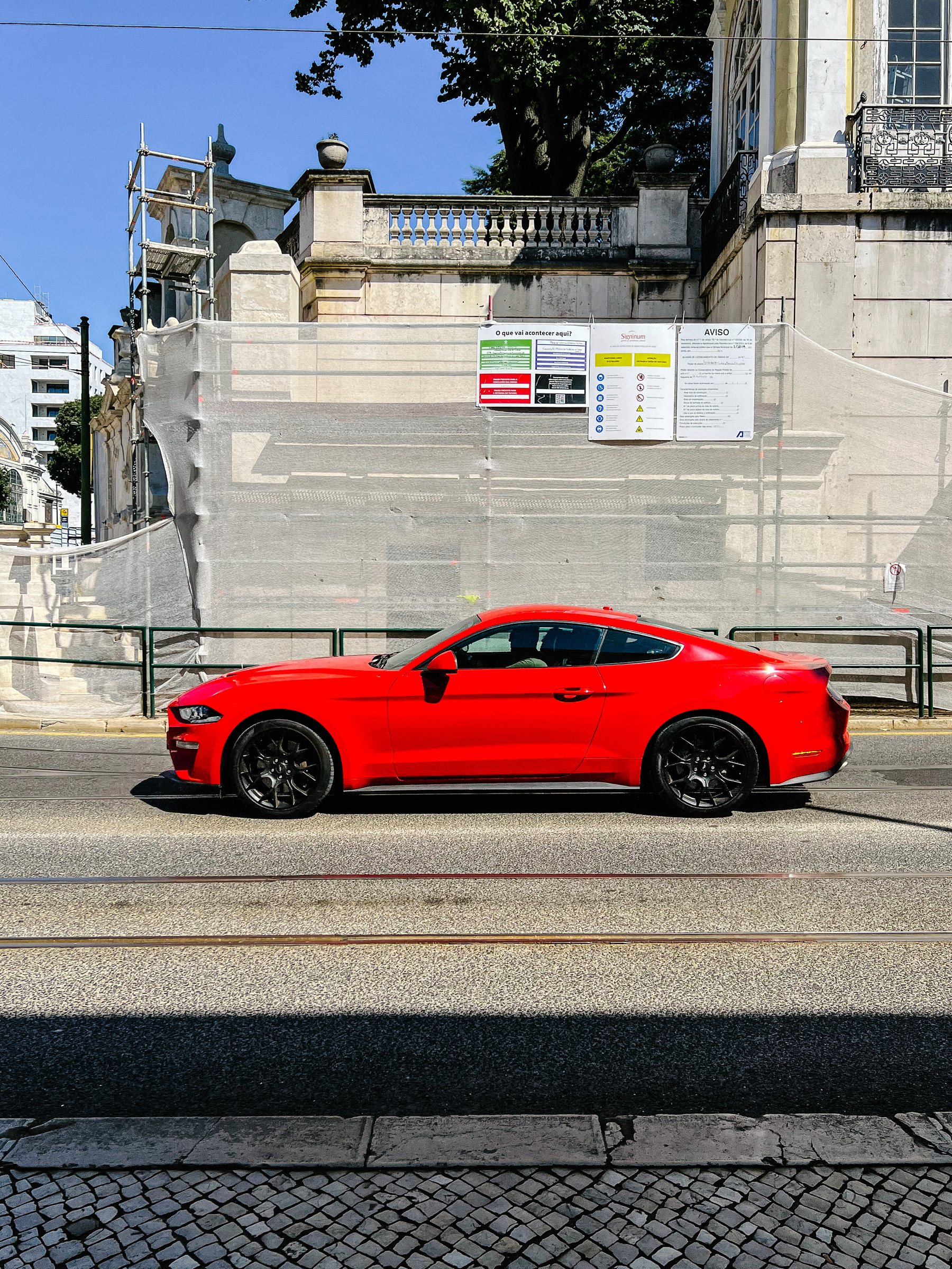 a red Ford Mustang