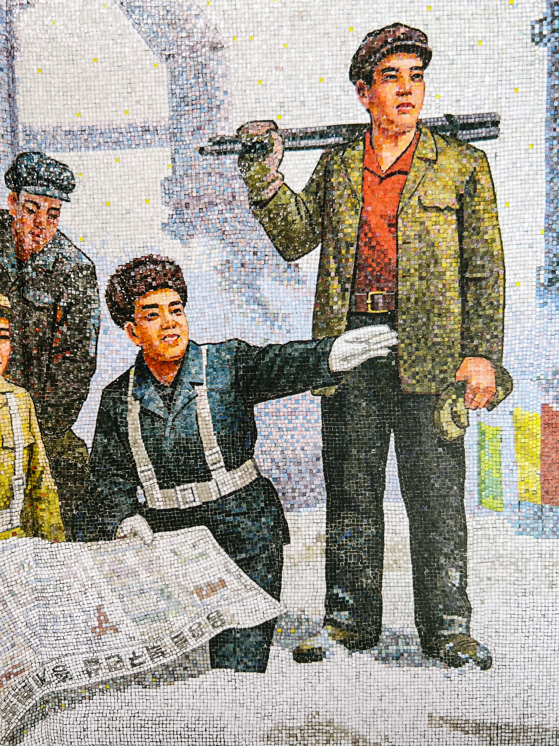 A North Korean tile panel. Workers looking ahead. 