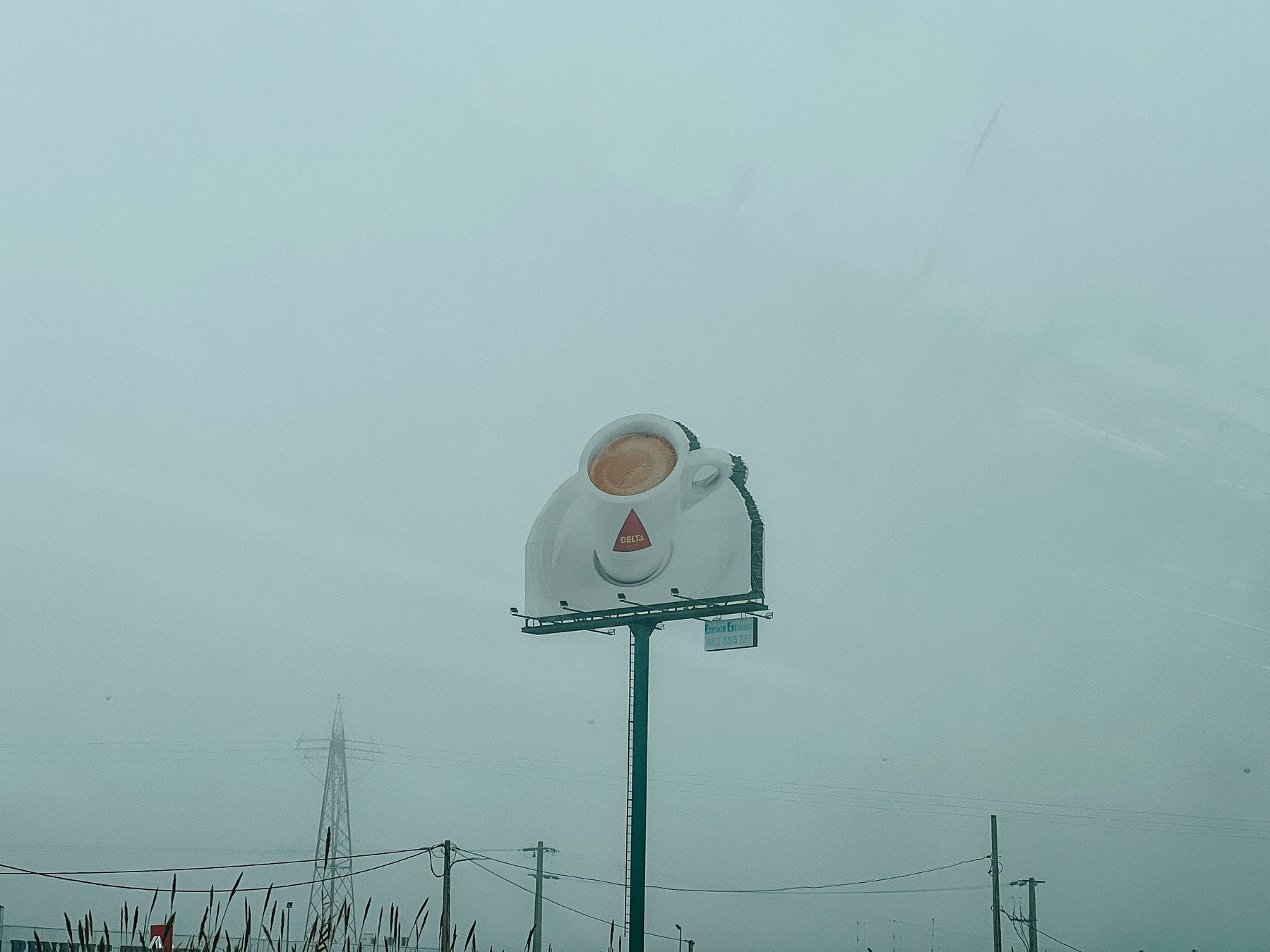 Highway ad for a coffee brand, there’s an espresso cup, a giant one.  