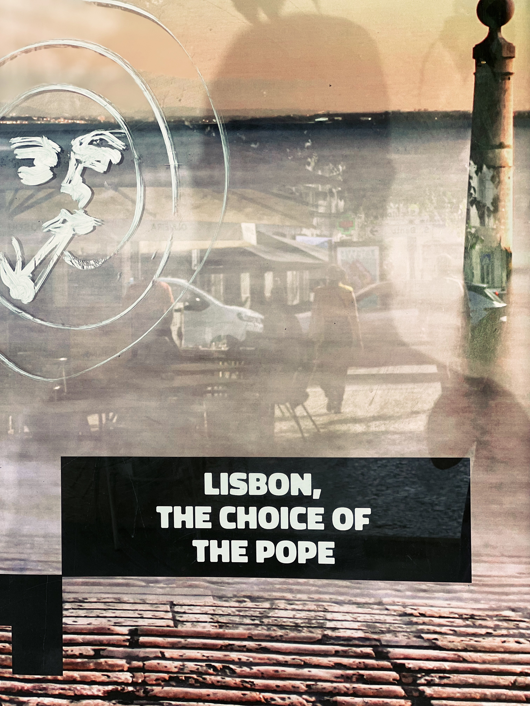 A poster with the words “Lisbon, the choice of the Pope”. 