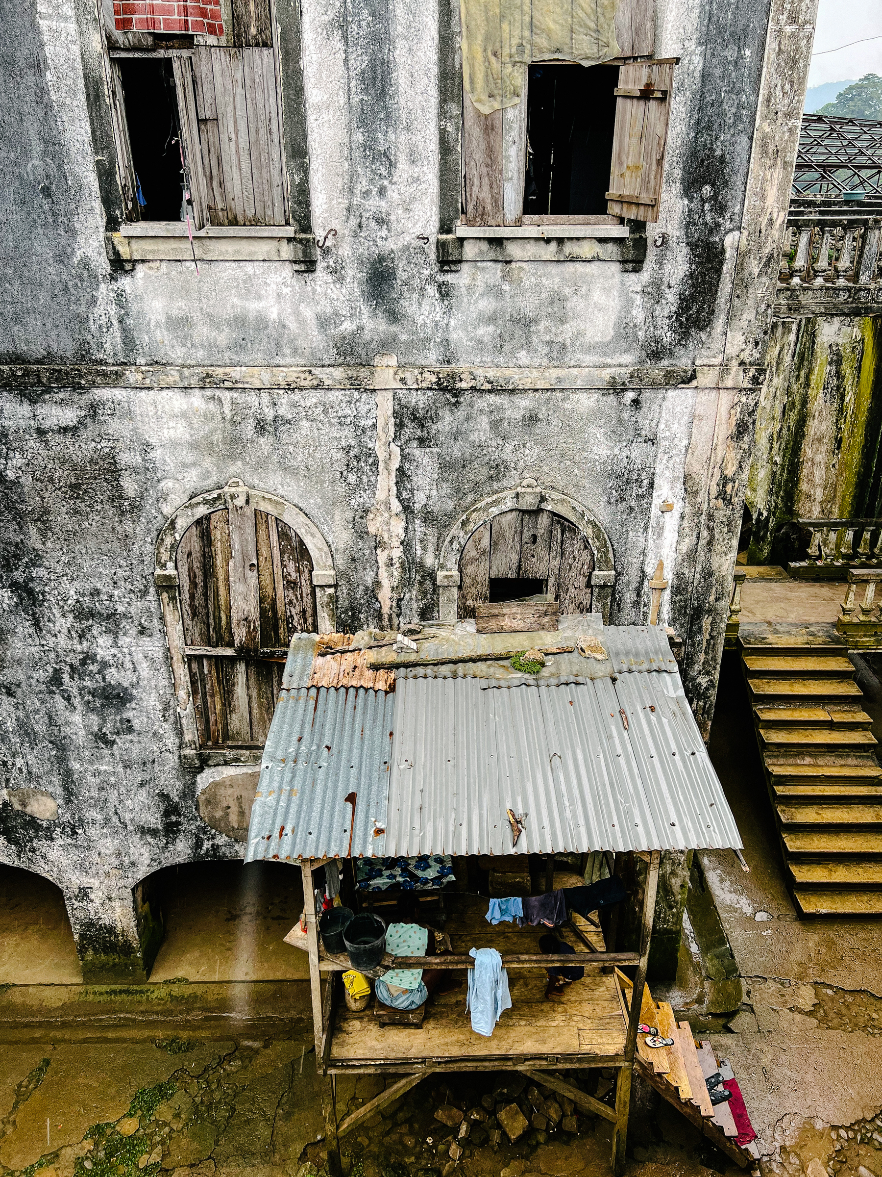 Looking down on a dilapidated building. 
