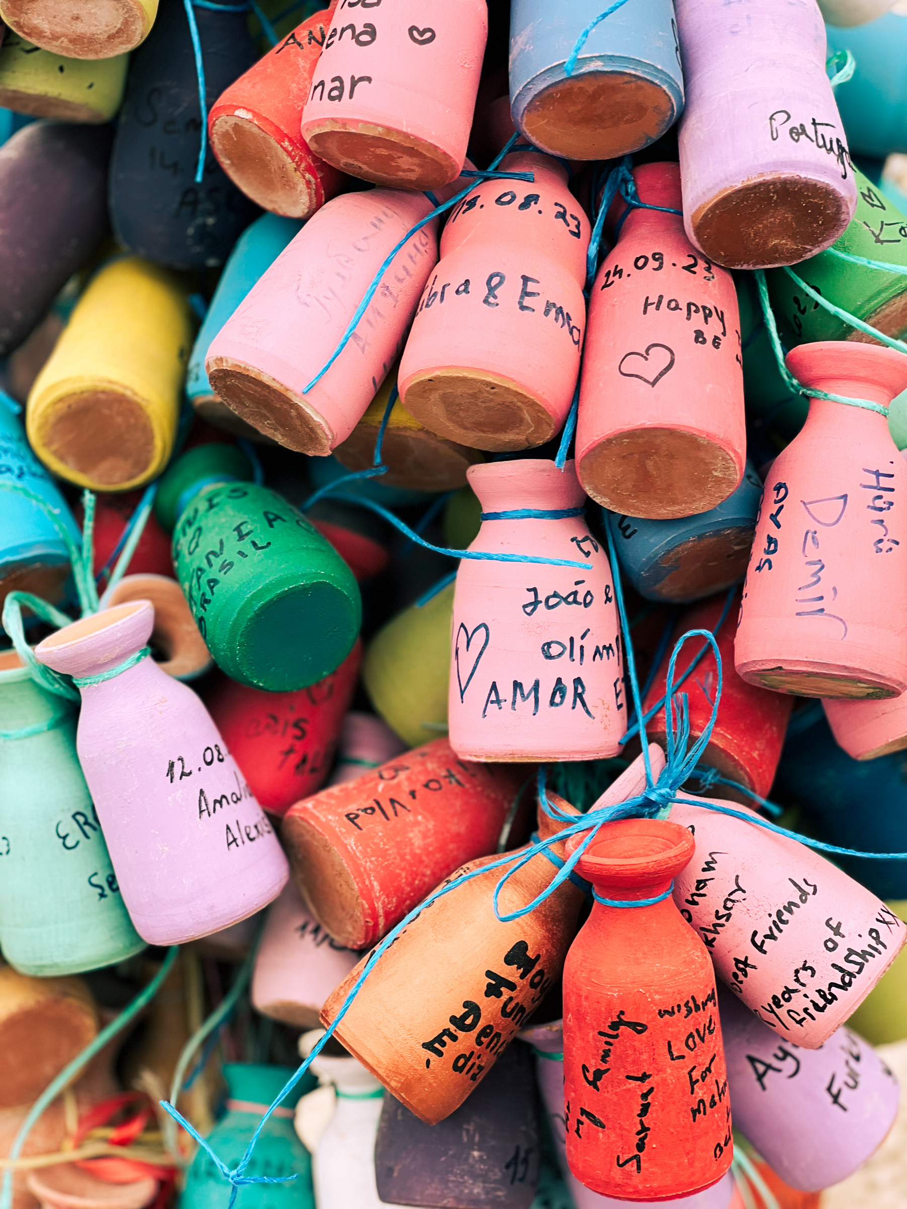 Colorful tiny pots, with love messages. 