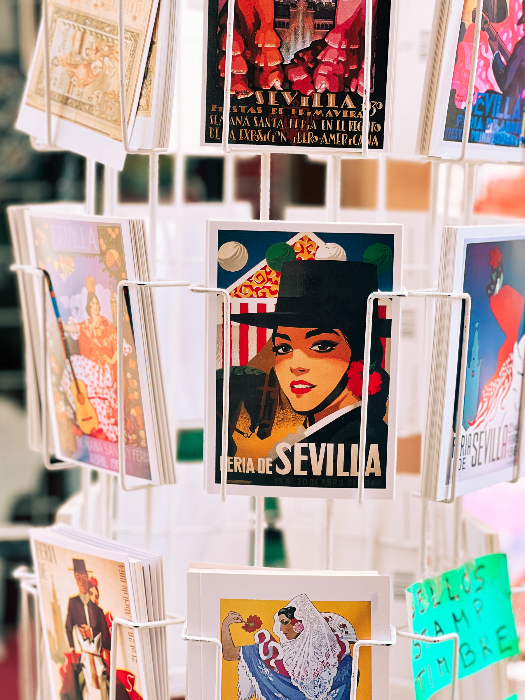 Sevilla postcards on a stand. 