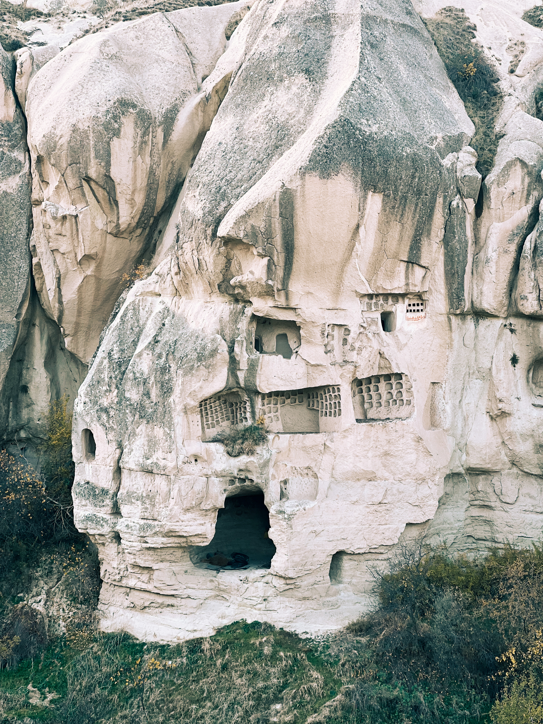 Houses carved into rock formations. 