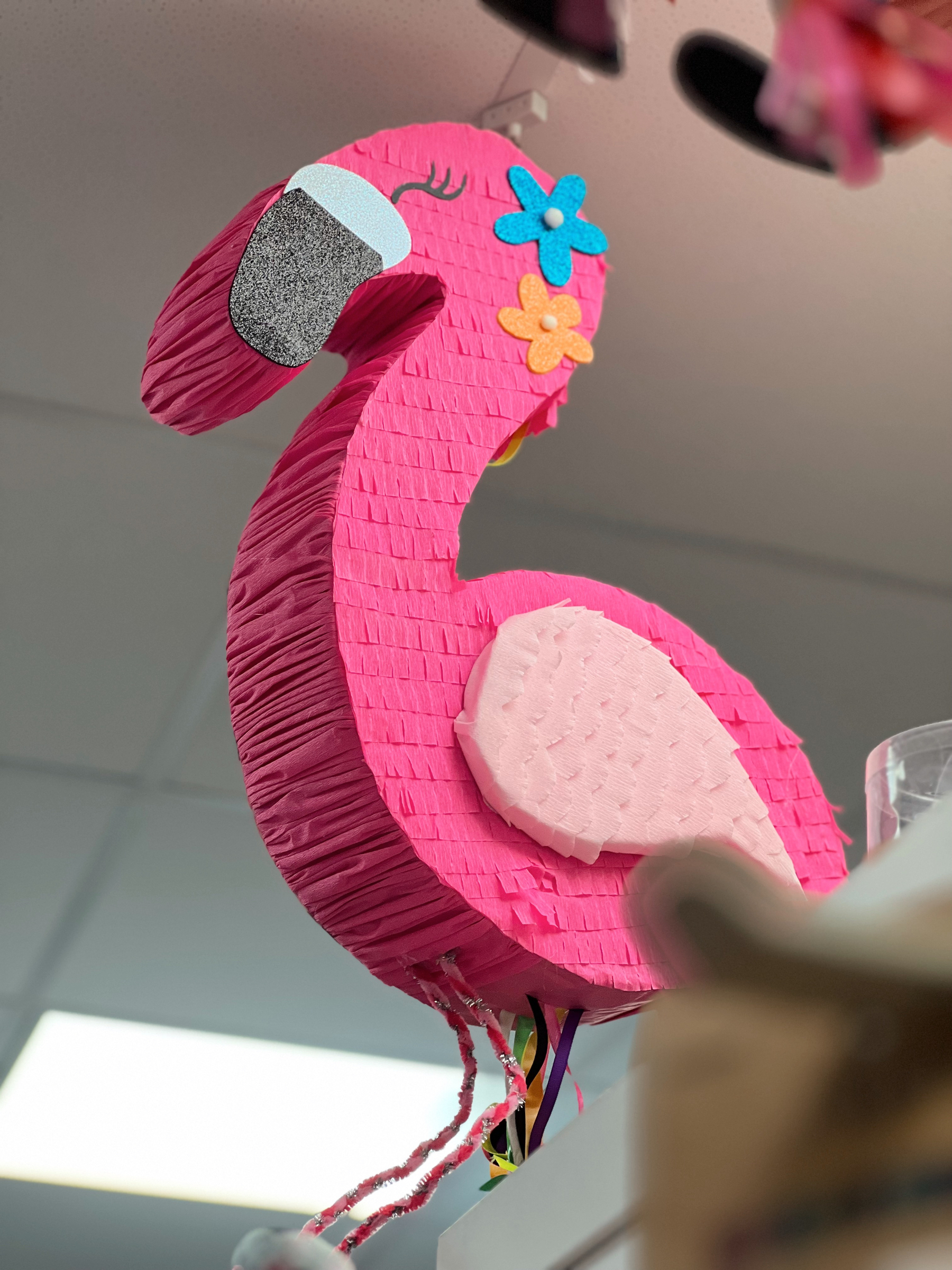 A pink flamingo piñata. 