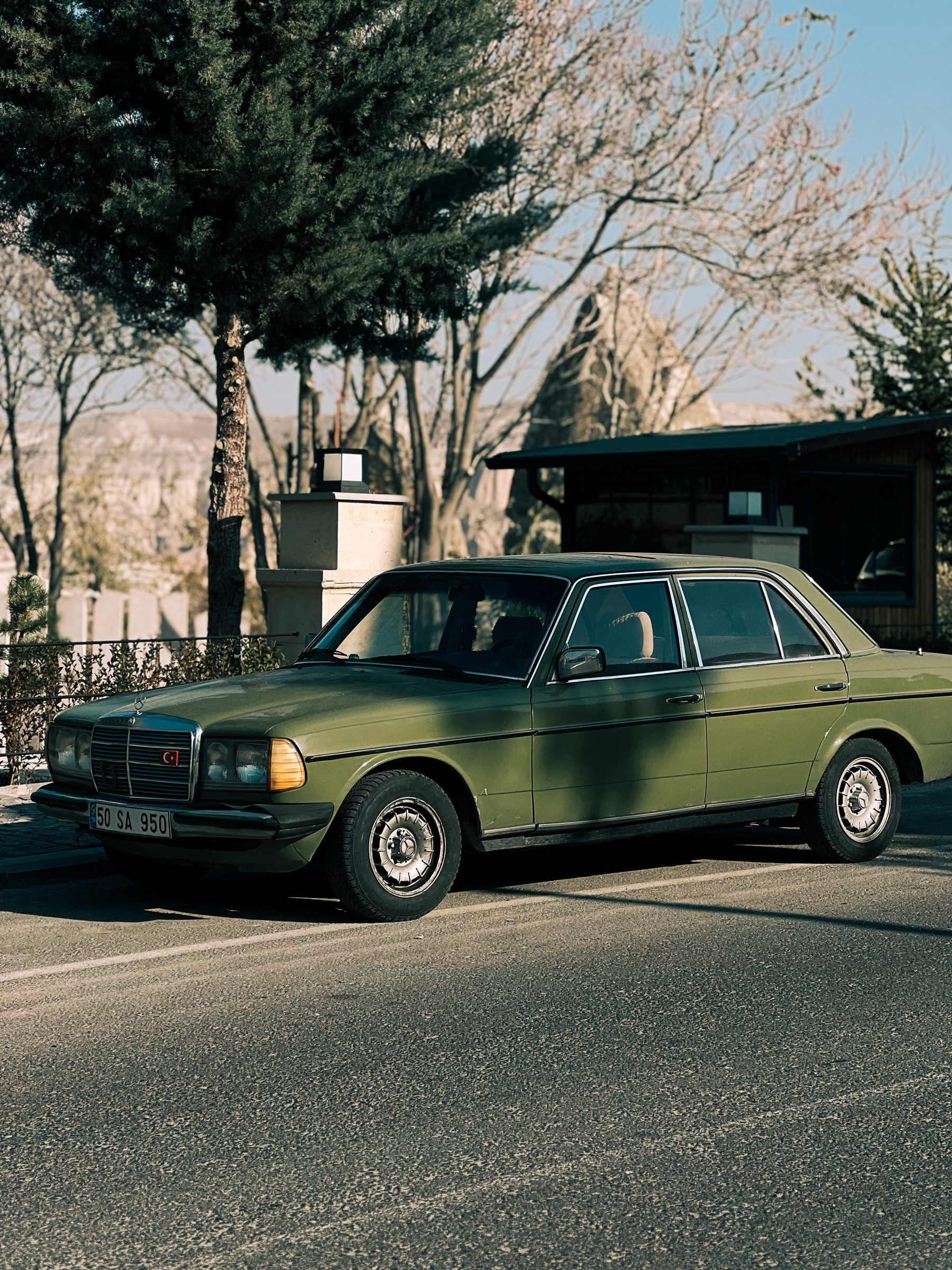 A green vintage Benz. 