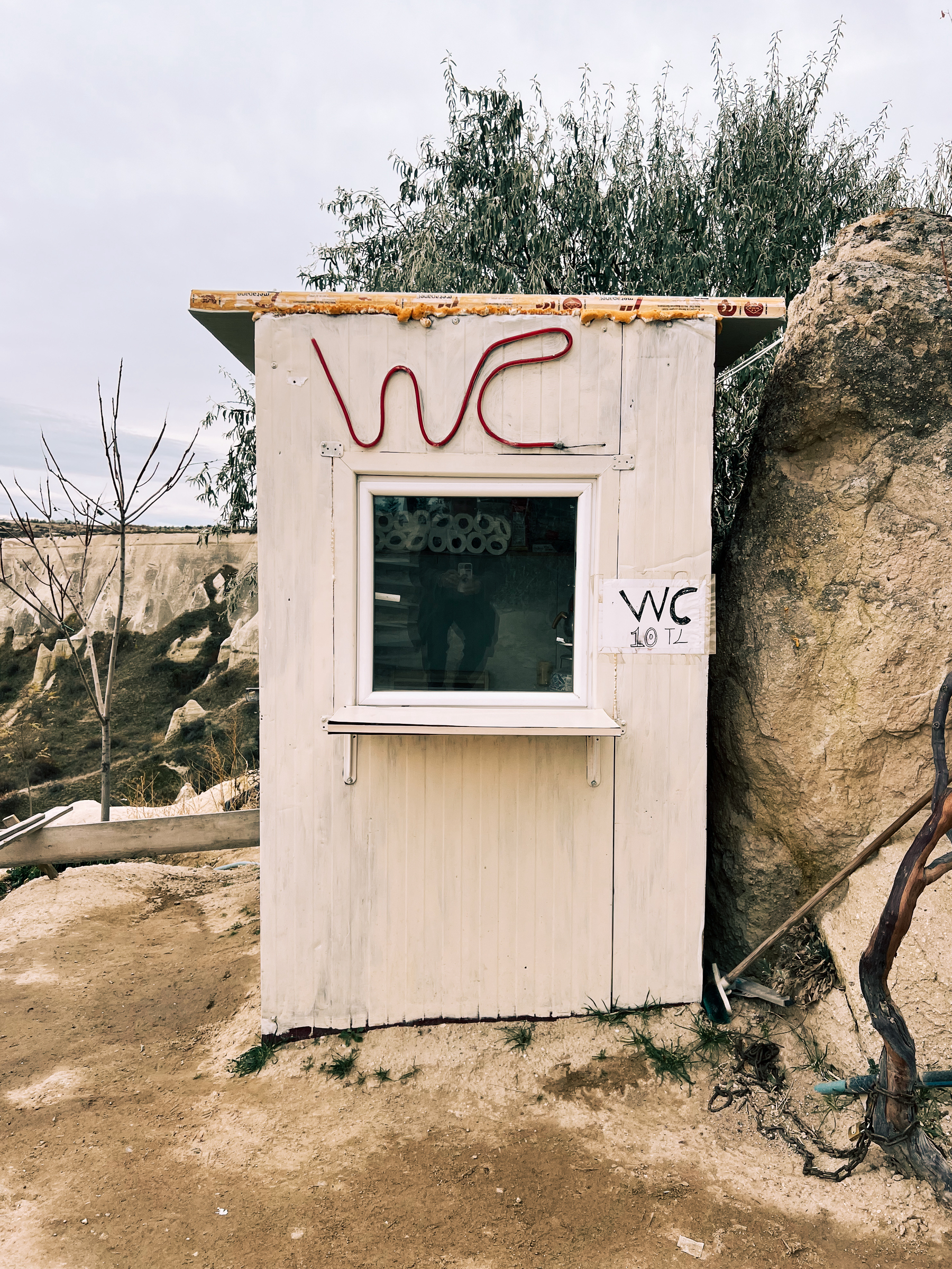 A shed. “WC” written on it. 