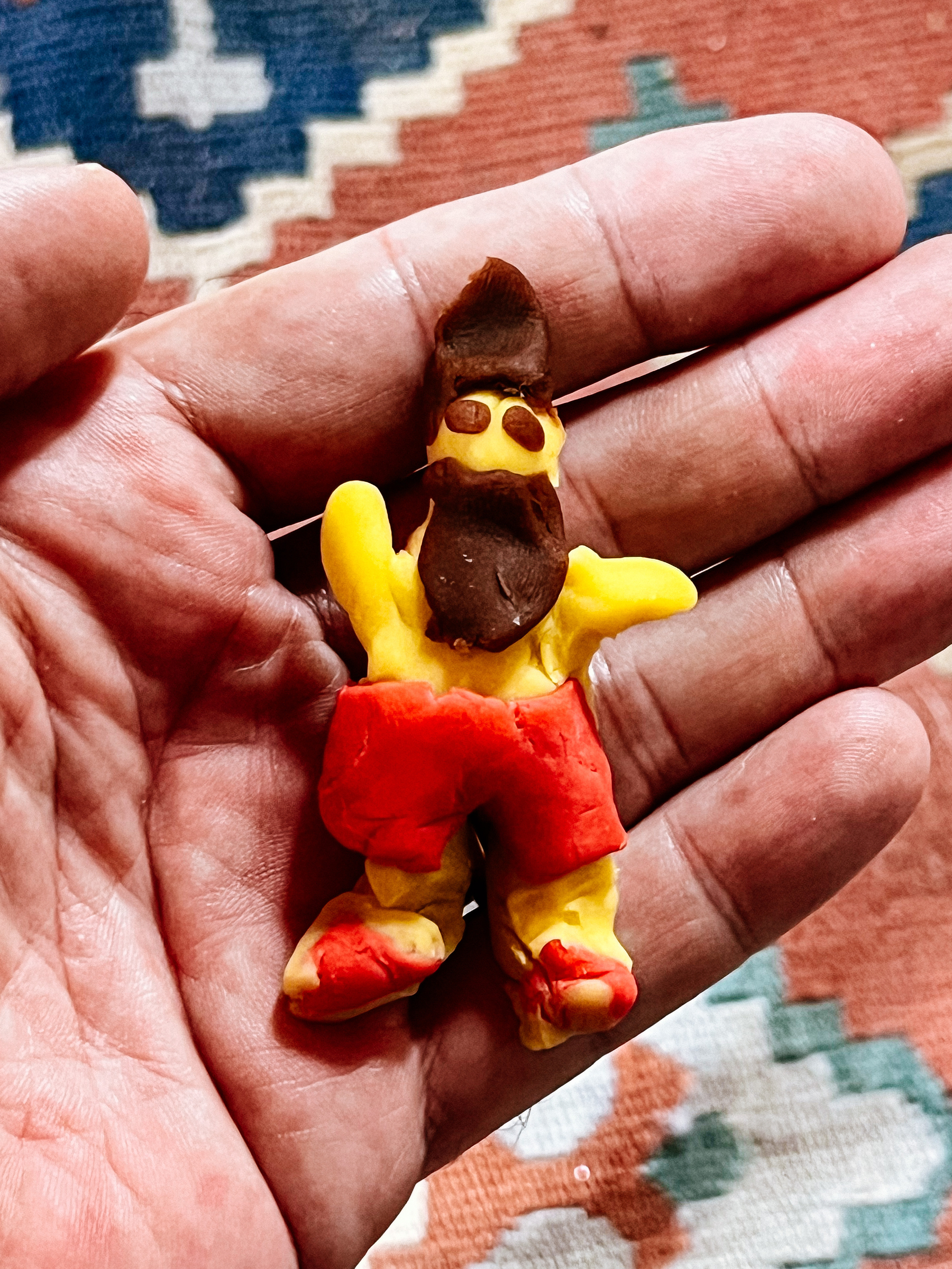 A man made of Play-Doh. 