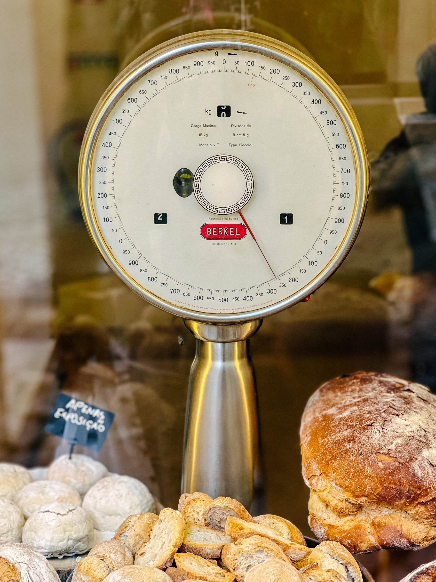 A scale in a bakery window. 