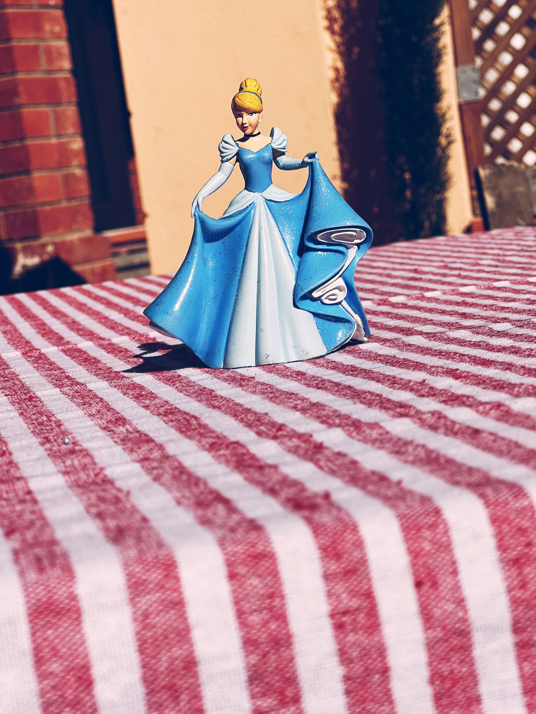 A Disney princess on a table. 