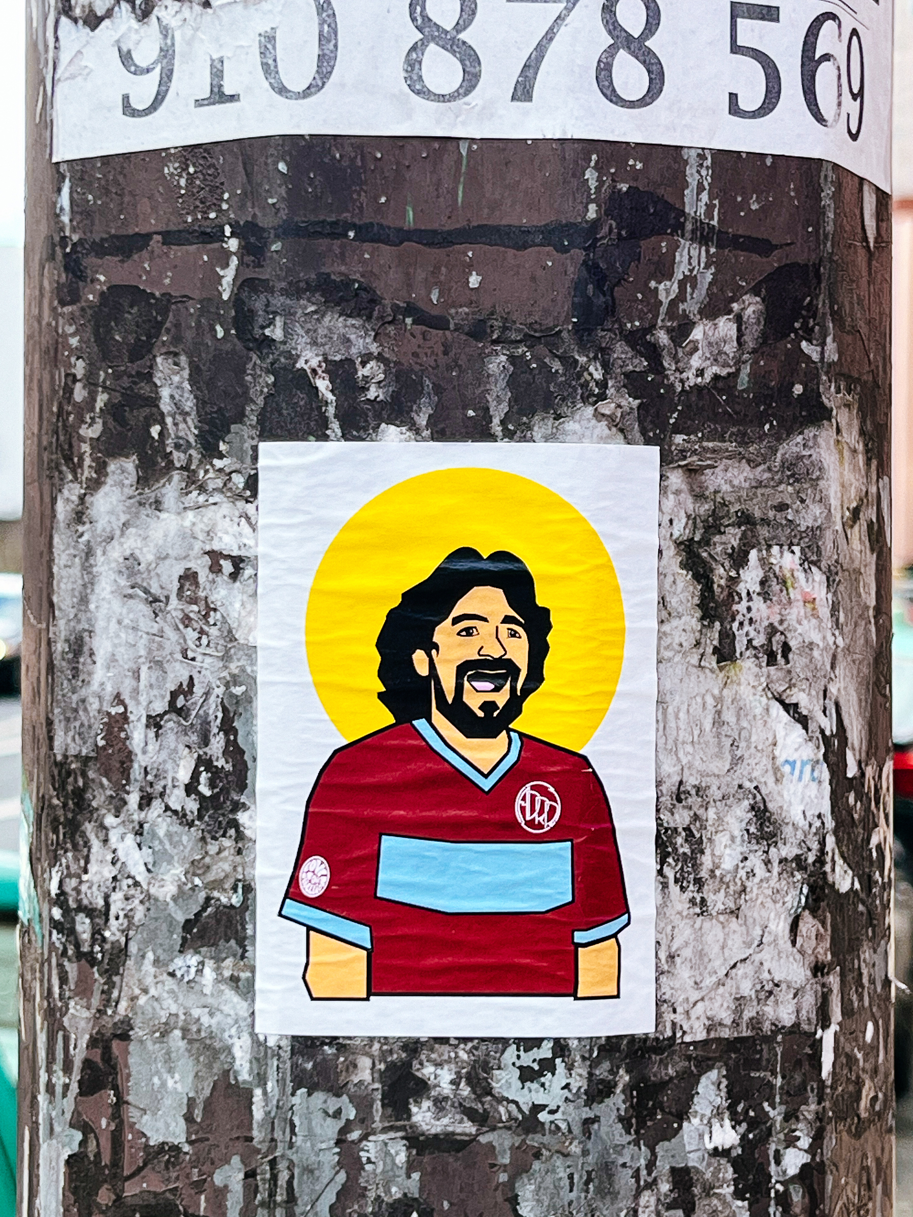 Drawing of football player, cartoony style. A sticker. 