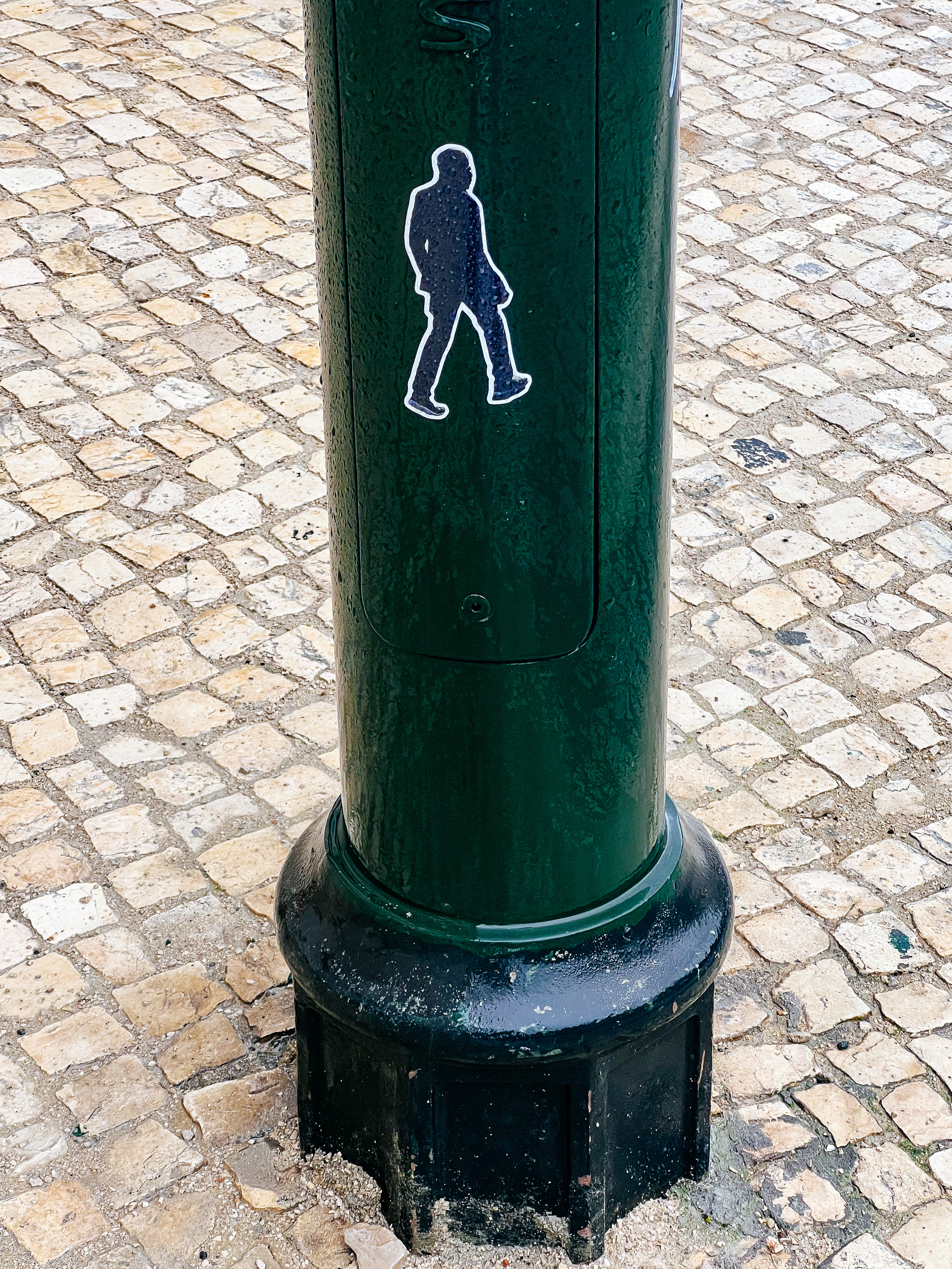 Sticker of a man walking. 