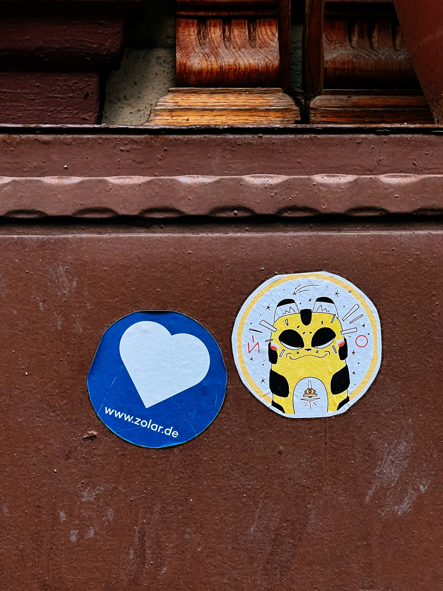 Two stickers. A heart one, and a cool looking cat drawing. A Neko, if you will. 