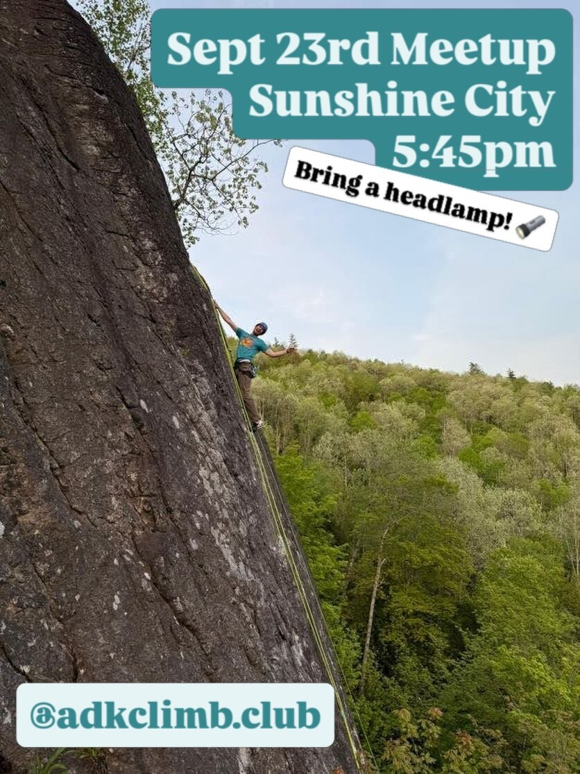 Climber scaling a steep rock face surrounded by dense forest under a clear sky. Text reads Sept 23rd Meetup Sunshine City 5:45pm Bring a headlamp @adkclimb.club