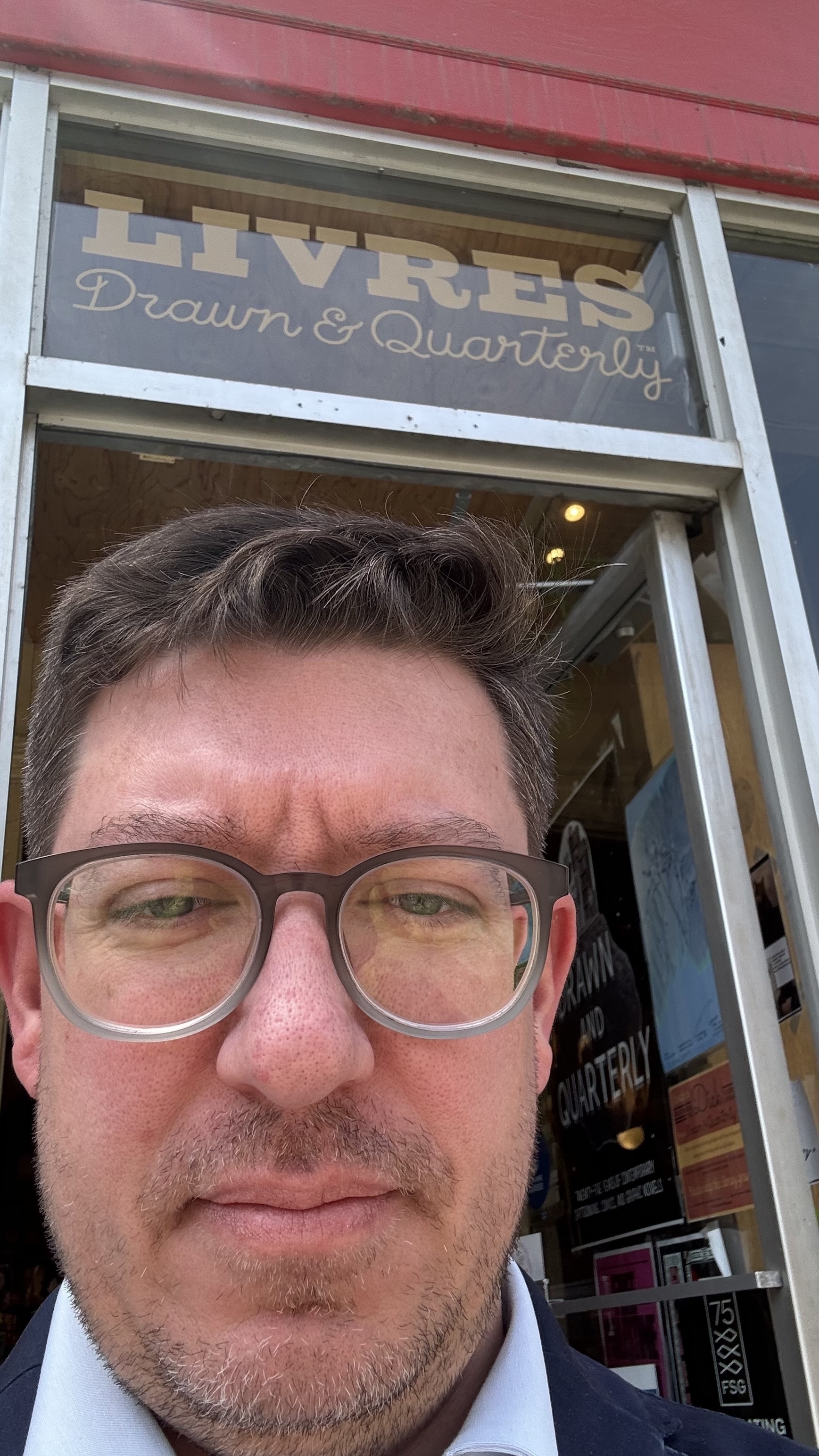 A selfie of me in front of Drawn & Quarterly Bookstore