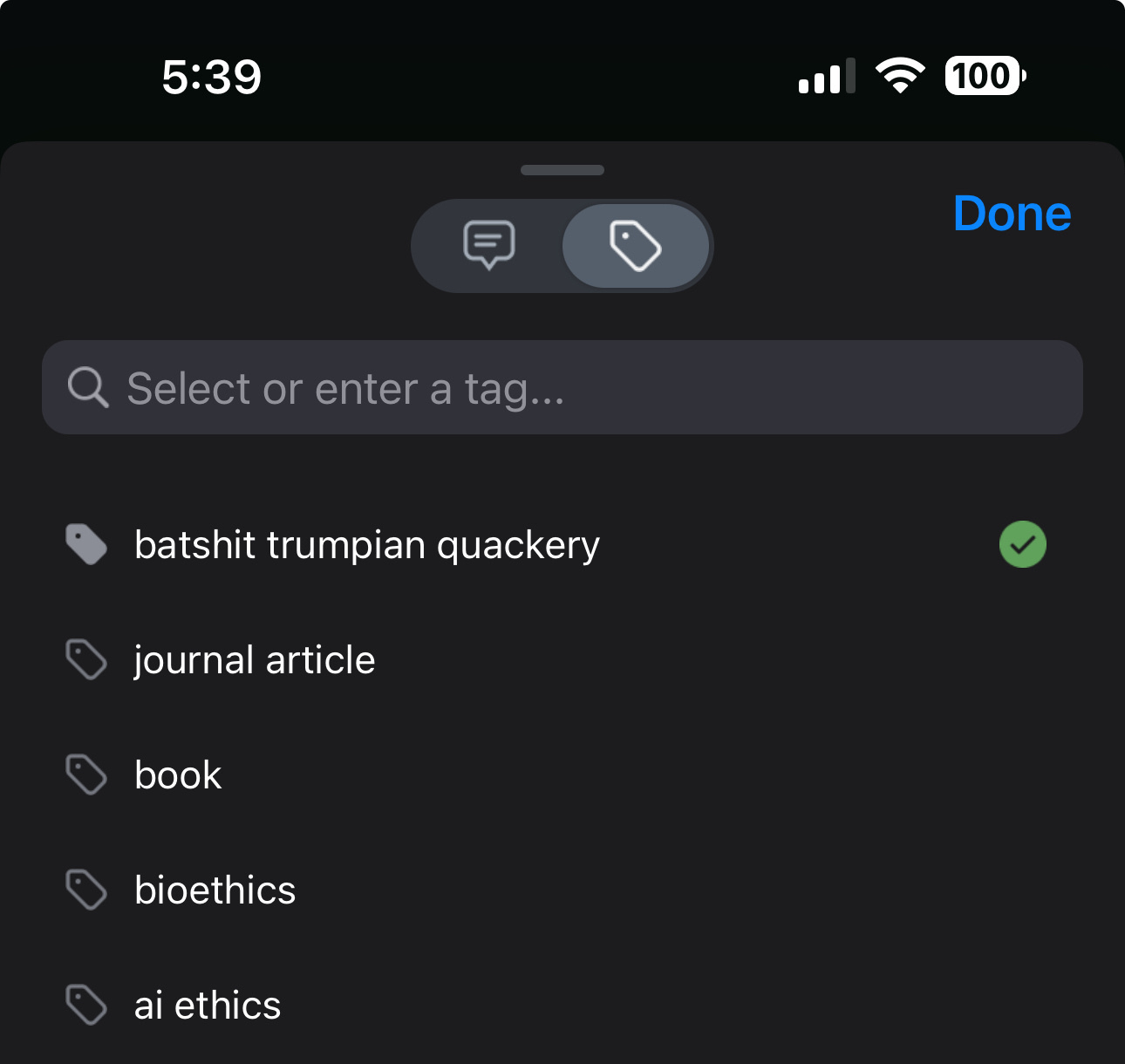 A cropped screenshot of my iPhone, with a list of tags in my Readwise Reader app. Tags include: "journal article," "book," "bioethics," and "ai ethics." At the top, is a new tag: "batshit trumpian quackery."