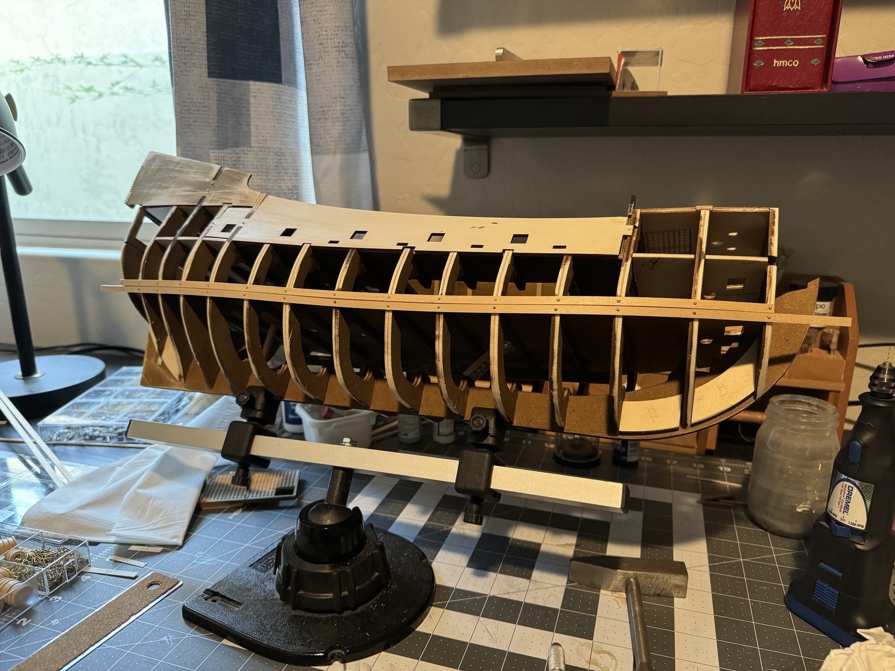 View of Flying Dutchman model ship with two rows of planing completed on the starboard side. 