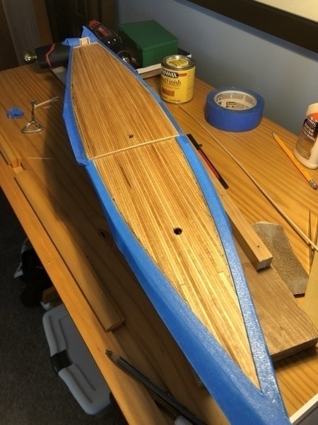 Deck planking of the Bluenose model ship completed and stained. 