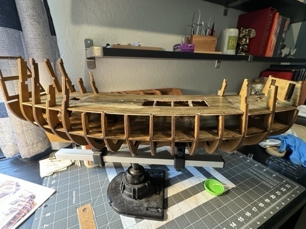 Side view of the Flying Dutchman model ship showing the upper and lower decks. 