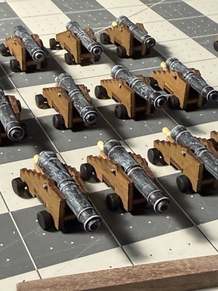 Close up view of some of the larger cannons built and painted for the flying dutchman model ship. 