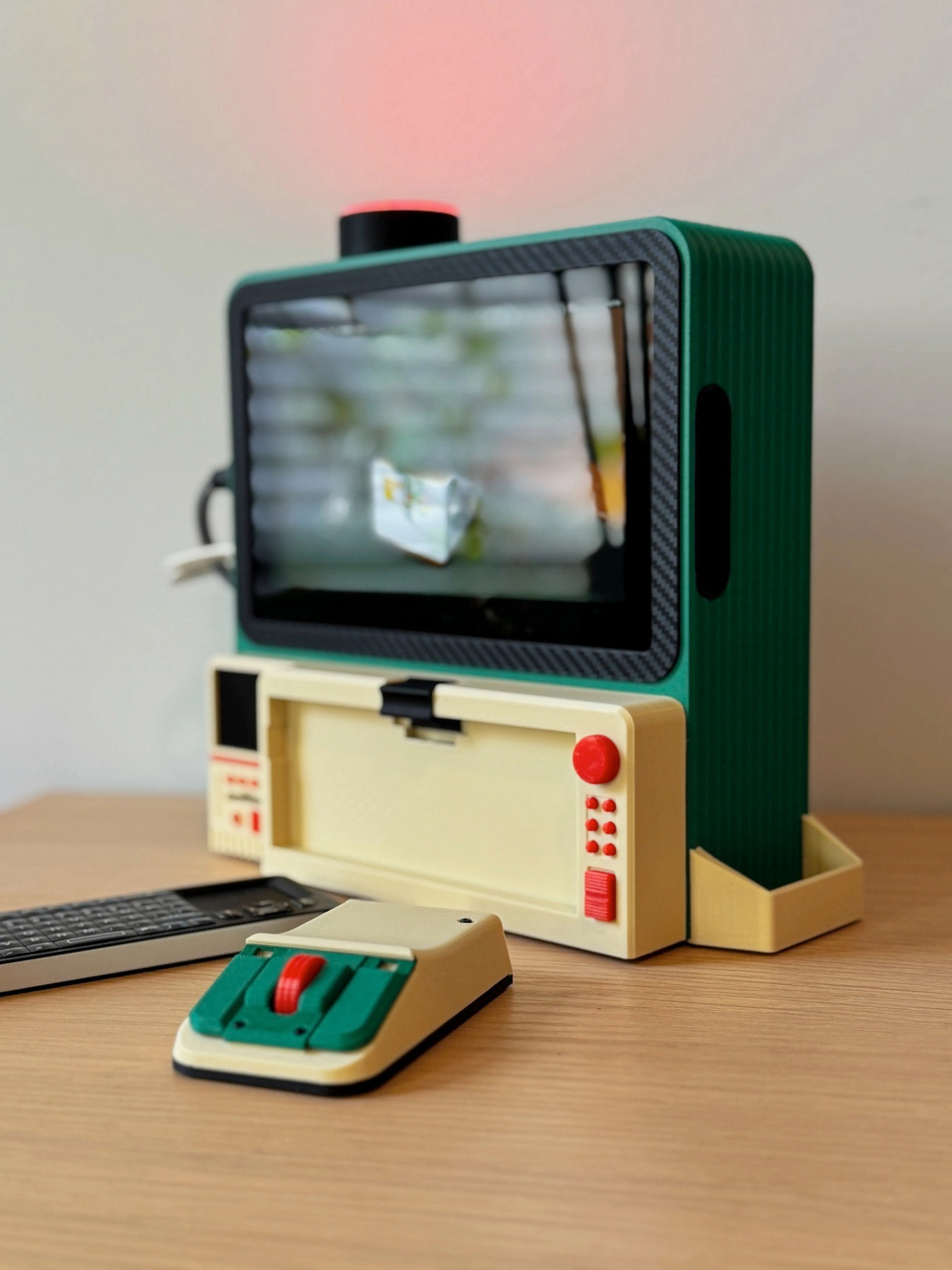 A Retro-inspired computer setup features a small green monitor with an attached beige keyboard and a matching mouse placed on a wooden surface.
u/3DBROOKLYN's Made my first cyberdeck