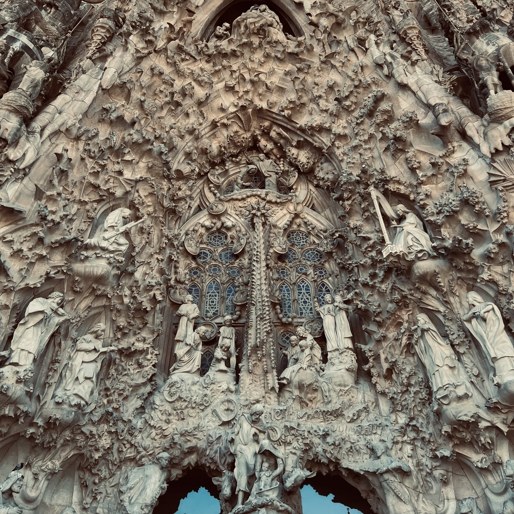 Ornate stone carving on the facade of Sagrada Familia.