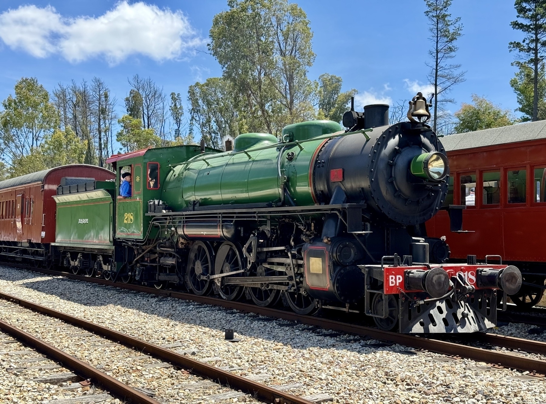A green steam locomotive.
