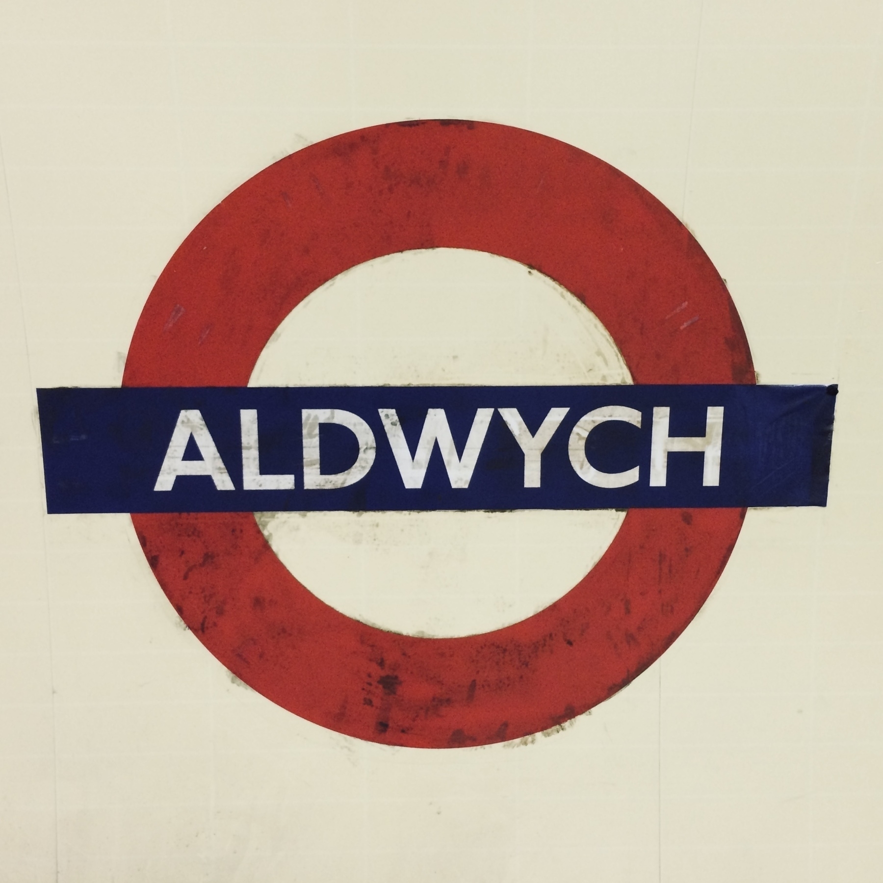 A tube roundel at the closed station Aldwych.