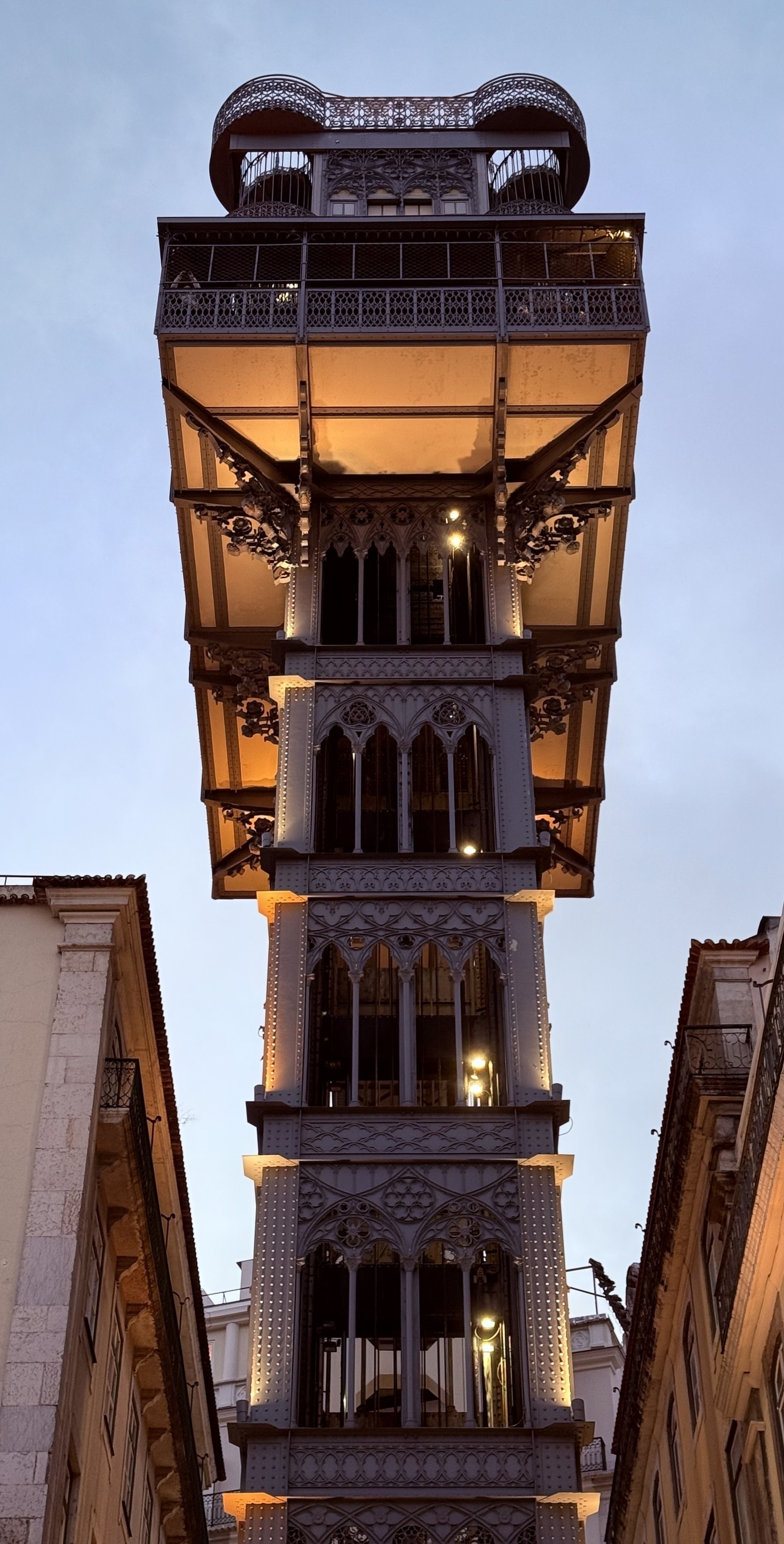 The ornate tower of Santa Justa elevator at dusk.